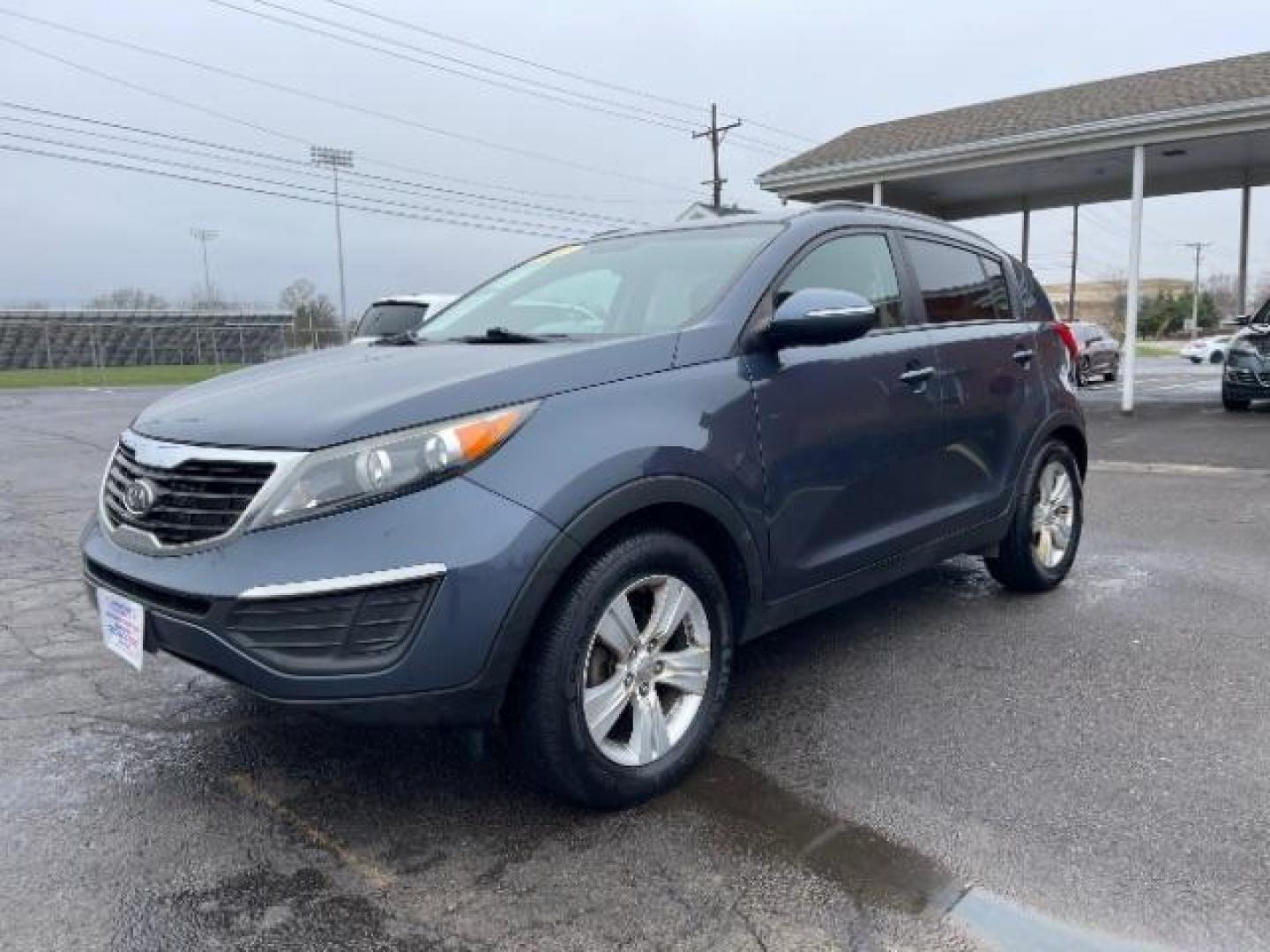 2011 Retro Blue Metallic Kia Sportage LX FWD (KNDPB3A22B7) with an 2.4L V6 DOHC 24V engine, 6-Speed Automatic transmission, located at 1230 East Main St, Xenia, OH, 45385, (937) 908-9800, 39.688026, -83.910172 - Photo#1