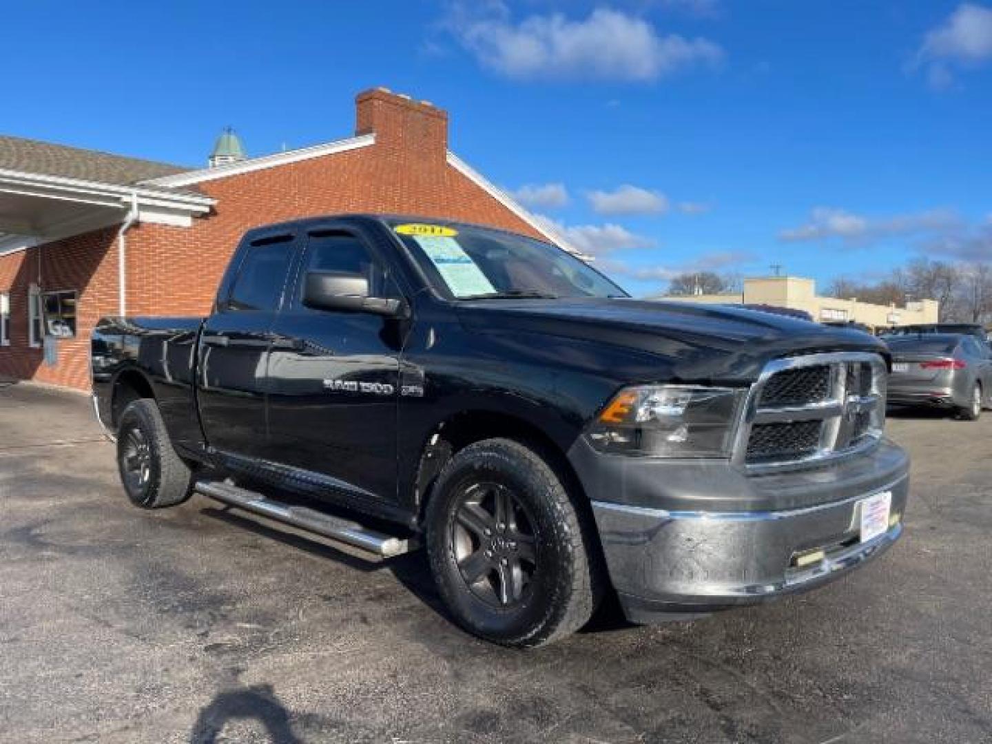 2011 Brilliant Black Crystal Pearl RAM 1500 Sport Quad Cab 4WD (1D7RV1GT2BS) with an 5.7L V8 OHV 16V engine, 5-Speed Automatic transmission, located at 401 Woodman Dr, Riverside, OH, 45431, (937) 908-9800, 39.760899, -84.123421 - Photo#0