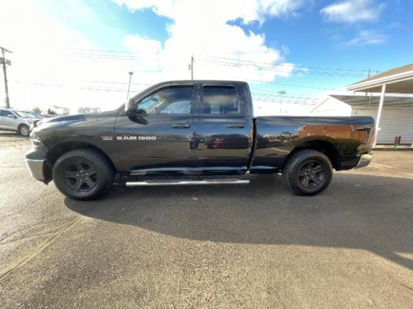 2011 Brilliant Black Crystal Pearl RAM 1500 Sport Quad Cab 4WD (1D7RV1GT2BS) with an 5.7L V8 OHV 16V engine, 5-Speed Automatic transmission, located at 401 Woodman Dr, Riverside, OH, 45431, (937) 908-9800, 39.760899, -84.123421 - Photo#2