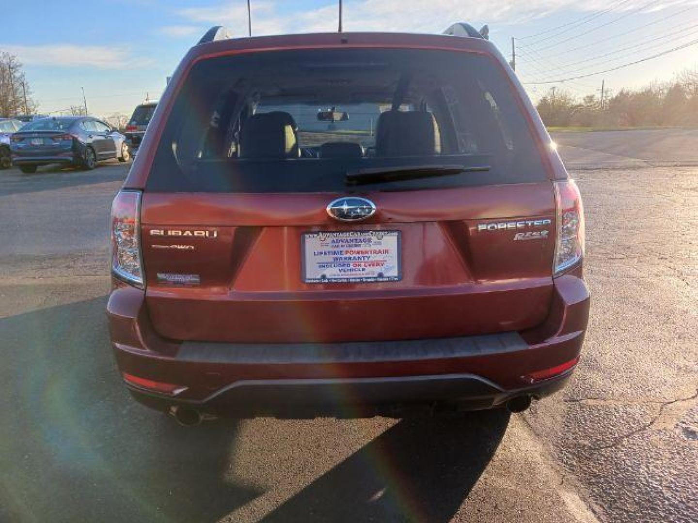 2011 Camellia Red Pearl Subaru Forester 2.5X Limited (JF2SHAEC2BH) with an 2.5L H4 SOHC 16V engine, 4-Speed Automatic transmission, located at 1230 East Main St, Xenia, OH, 45385, (937) 908-9800, 39.688026, -83.910172 - Photo#5