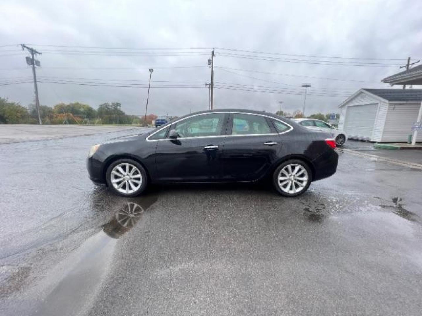 2012 Black Onyx Buick Verano Base (1G4PP5SK2C4) with an 2.4L L4 DOHC 16V FFV engine, 6-Speed Automatic transmission, located at 4508 South Dixie Dr, Moraine, OH, 45439, (937) 908-9800, 39.689976, -84.218452 - Photo#3