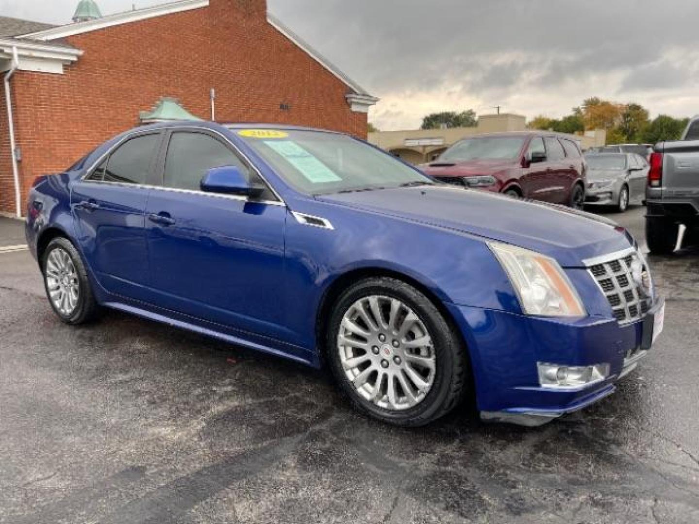 2012 Opulent Blue Metallic Cadillac CTS 3.6L Performance AWD (1G6DL5E37C0) with an 3.6L V6 DOHC 24V FFV engine, 6-Speed Automatic transmission, located at 1230 East Main St, Xenia, OH, 45385, (937) 908-9800, 39.688026, -83.910172 - Photo#0