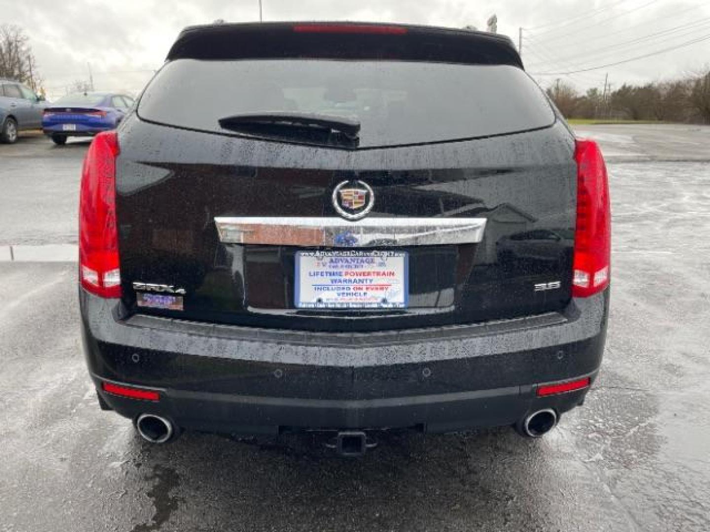 2012 Black Raven Cadillac SRX Luxury AWD (3GYFNDE35CS) with an 3.6L V6 DOHC 24V FFV engine, 6-Speed Automatic transmission, located at 1184 Kauffman Ave, Fairborn, OH, 45324, (937) 908-9800, 39.807072, -84.030914 - Photo#4