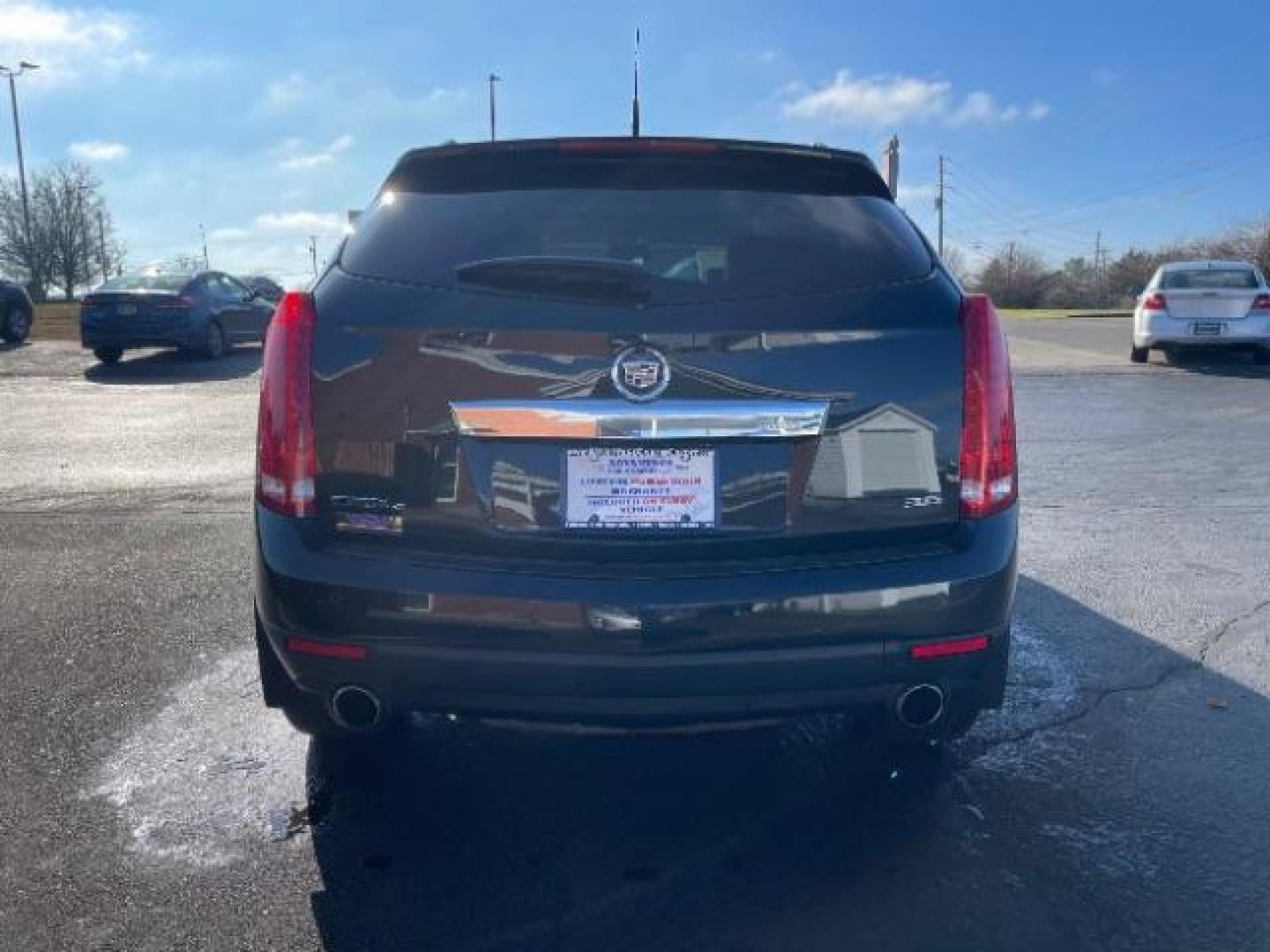 2012 Black Raven Cadillac SRX Luxury AWD (3GYFNDE34CS) with an 3.6L V6 DOHC 24V FFV engine, 6-Speed Automatic transmission, located at 1951 S Dayton Lakeview Rd., New Carlisle, OH, 45344, (937) 908-9800, 39.890999, -84.050255 - Photo#4