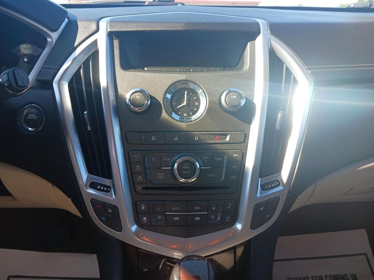 2012 White Cadillac SRX Luxury AWD (3GYFNDE38CS) with an 3.6L V6 DOHC 24V FFV engine, 6-Speed Automatic transmission, located at 880 E. National Road, Vandalia, OH, 45377, (937) 908-9800, 39.891918, -84.183594 - Photo#12