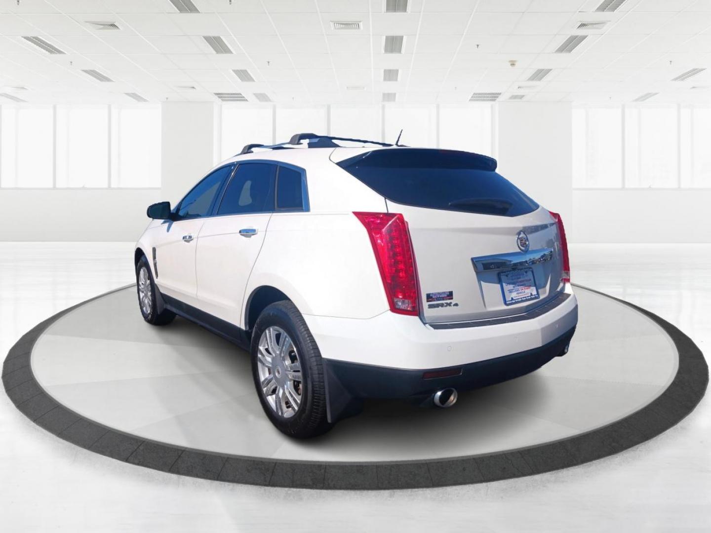 2012 White Cadillac SRX Luxury AWD (3GYFNDE38CS) with an 3.6L V6 DOHC 24V FFV engine, 6-Speed Automatic transmission, located at 880 E. National Road, Vandalia, OH, 45377, (937) 908-9800, 39.891918, -84.183594 - Photo#4