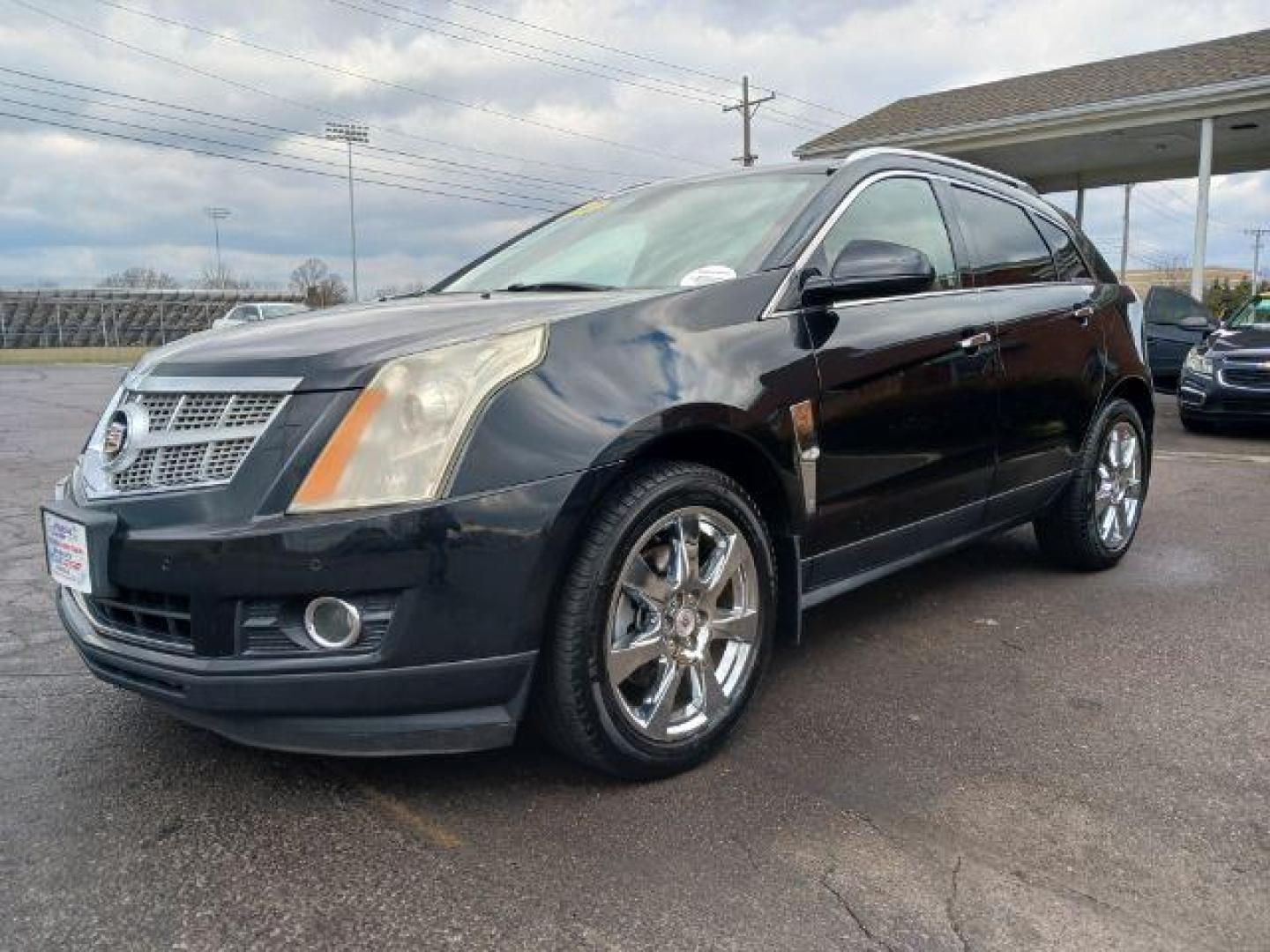 2012 Black Ice Metallic Cadillac SRX Premium AWD (3GYFNFE30CS) with an 3.6L V6 DOHC 24V FFV engine, 6-Speed Automatic transmission, located at 1230 East Main St, Xenia, OH, 45385, (937) 908-9800, 39.688026, -83.910172 - Photo#2