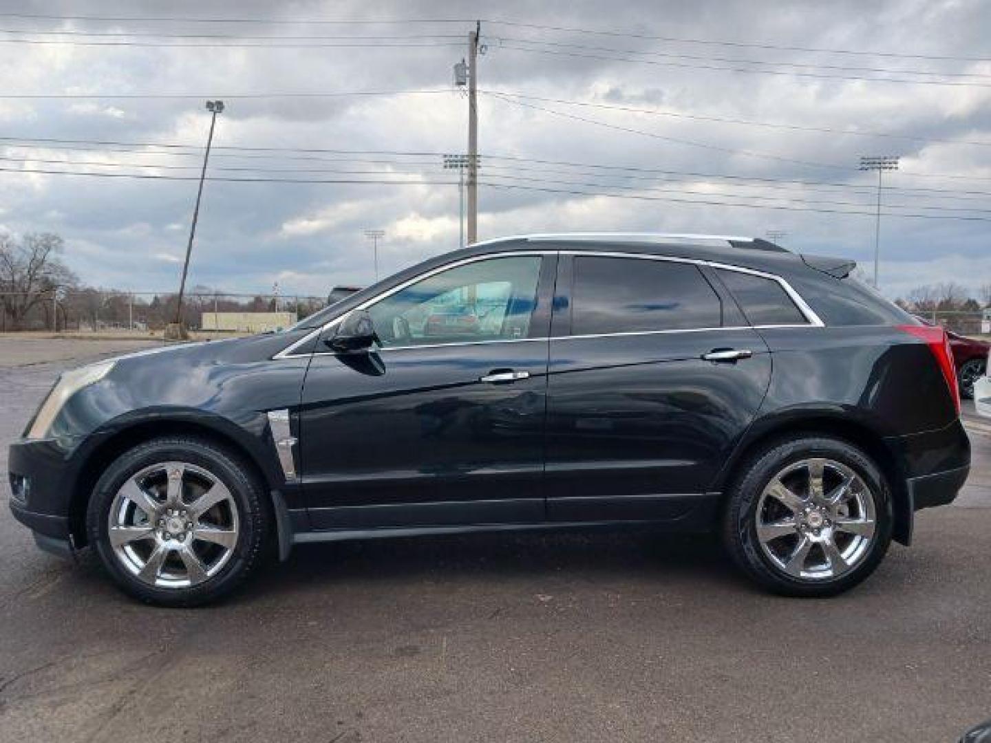 2012 Black Ice Metallic Cadillac SRX Premium AWD (3GYFNFE30CS) with an 3.6L V6 DOHC 24V FFV engine, 6-Speed Automatic transmission, located at 1230 East Main St, Xenia, OH, 45385, (937) 908-9800, 39.688026, -83.910172 - Photo#3