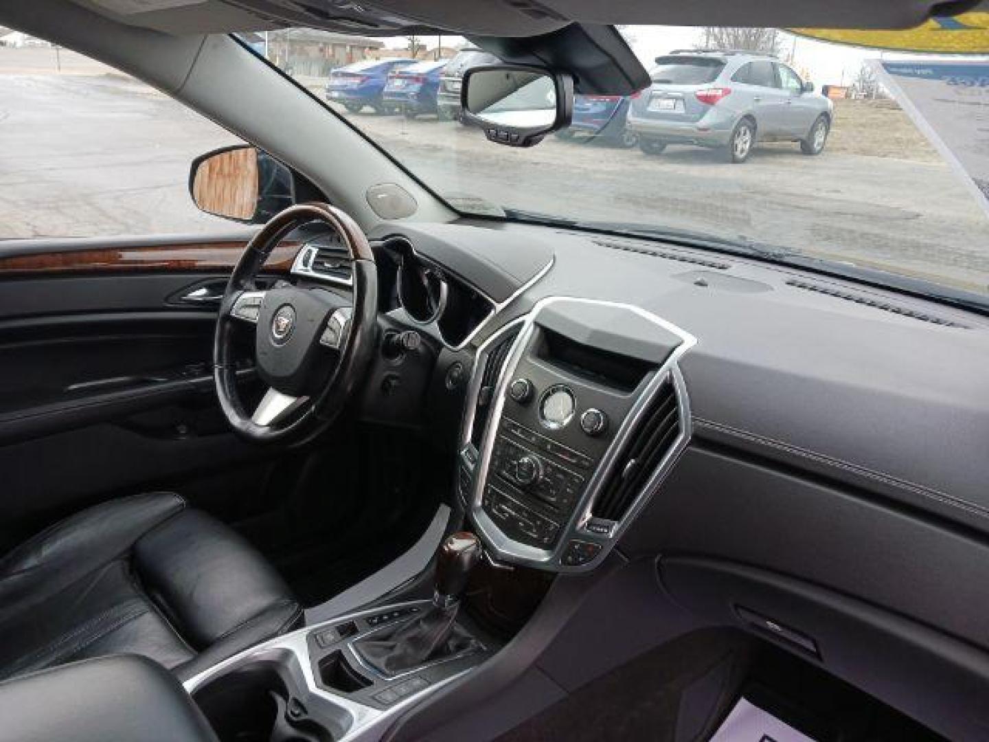 2012 Black Ice Metallic Cadillac SRX Premium AWD (3GYFNFE30CS) with an 3.6L V6 DOHC 24V FFV engine, 6-Speed Automatic transmission, located at 1230 East Main St, Xenia, OH, 45385, (937) 908-9800, 39.688026, -83.910172 - Photo#8