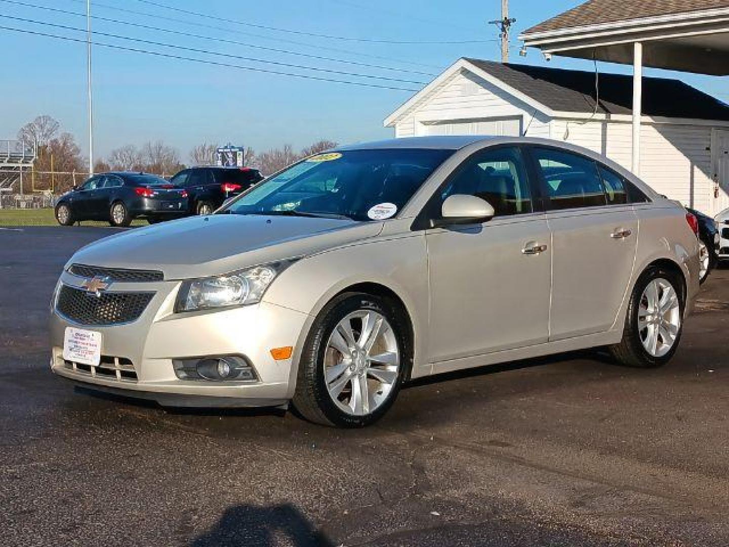 2012 Gold Mist Metallic Chevrolet Cruze LTZ (1G1PH5SC3C7) with an 1.4L L4 DOHC 16V TURBO engine, 6-Speed Automatic transmission, located at 4508 South Dixie Dr, Moraine, OH, 45439, (937) 908-9800, 39.689976, -84.218452 - Photo#2