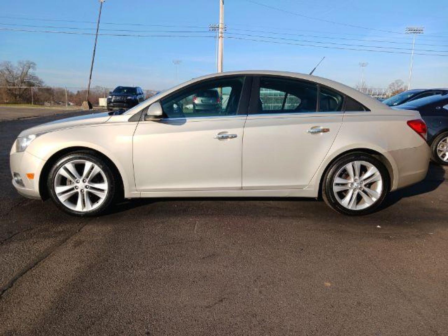 2012 Gold Mist Metallic Chevrolet Cruze LTZ (1G1PH5SC3C7) with an 1.4L L4 DOHC 16V TURBO engine, 6-Speed Automatic transmission, located at 4508 South Dixie Dr, Moraine, OH, 45439, (937) 908-9800, 39.689976, -84.218452 - Photo#3