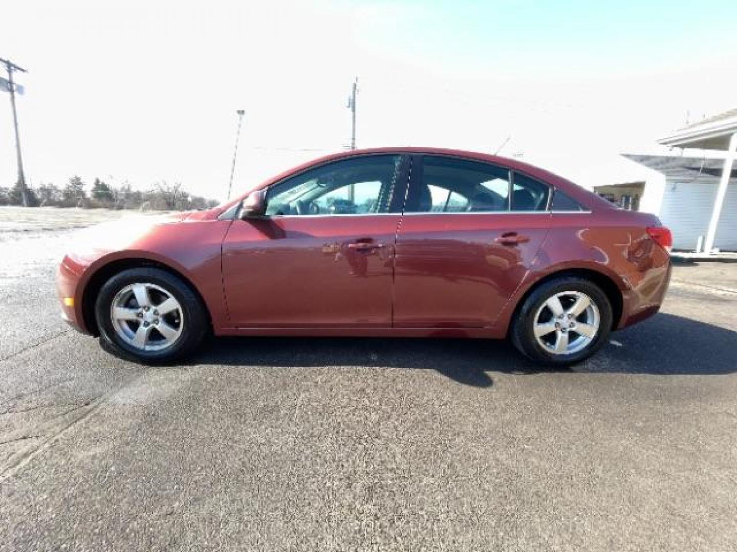 2012 Orange Chevrolet Cruze 1LT (1G1PF5SC6C7) with an 1.4L L4 DOHC 16V TURBO engine, 6-Speed Automatic transmission, located at 4508 South Dixie Dr, Moraine, OH, 45439, (937) 908-9800, 39.689976, -84.218452 - Photo#2