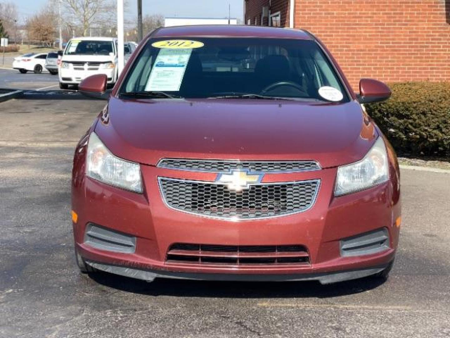 2012 Orange Chevrolet Cruze 1LT (1G1PF5SC6C7) with an 1.4L L4 DOHC 16V TURBO engine, 6-Speed Automatic transmission, located at 4508 South Dixie Dr, Moraine, OH, 45439, (937) 908-9800, 39.689976, -84.218452 - Photo#4