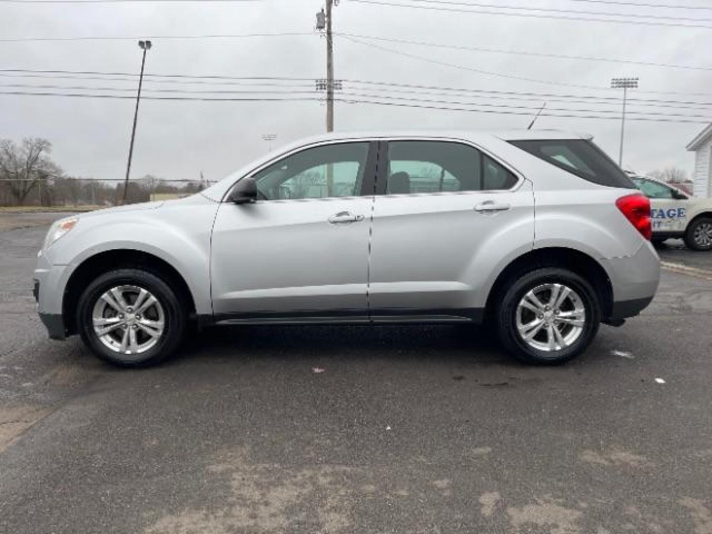 2012 Silver Ice Metallic Chevrolet Equinox LS 2WD (2GNALBEK4C1) with an 2.4L L4 DOHC 16V engine, 6-Speed Automatic transmission, located at 1230 East Main St, Xenia, OH, 45385, (937) 908-9800, 39.688026, -83.910172 - Photo#2