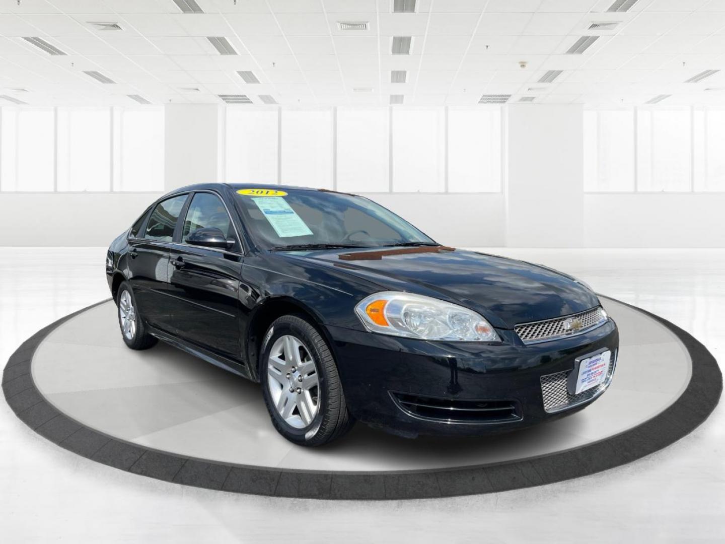 2012 Black Chevrolet Impala LT (2G1WB5E33C1) with an 3.6L V6 DOHC 16V FFV engine, 6-Speed Automatic transmission, located at 1099 N County Rd 25A, Troy, OH, 45373, (937) 908-9800, 40.057079, -84.212883 - Photo#0