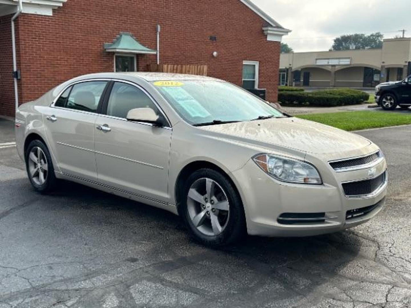 2012 Gold Mist Metallic Chevrolet Malibu 1LT (1G1ZC5E07CF) with an 2.4L L4 DOHC 16V engine, 6-Speed Automatic transmission, located at 1099 N County Rd 25A, Troy, OH, 45373, (937) 908-9800, 40.057079, -84.212883 - Photo#0