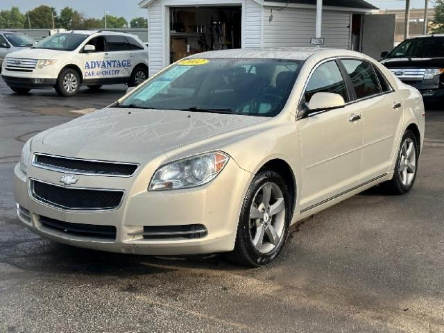 2012 Gold Mist Metallic Chevrolet Malibu 1LT (1G1ZC5E07CF) with an 2.4L L4 DOHC 16V engine, 6-Speed Automatic transmission, located at 1099 N County Rd 25A, Troy, OH, 45373, (937) 908-9800, 40.057079, -84.212883 - Photo#1