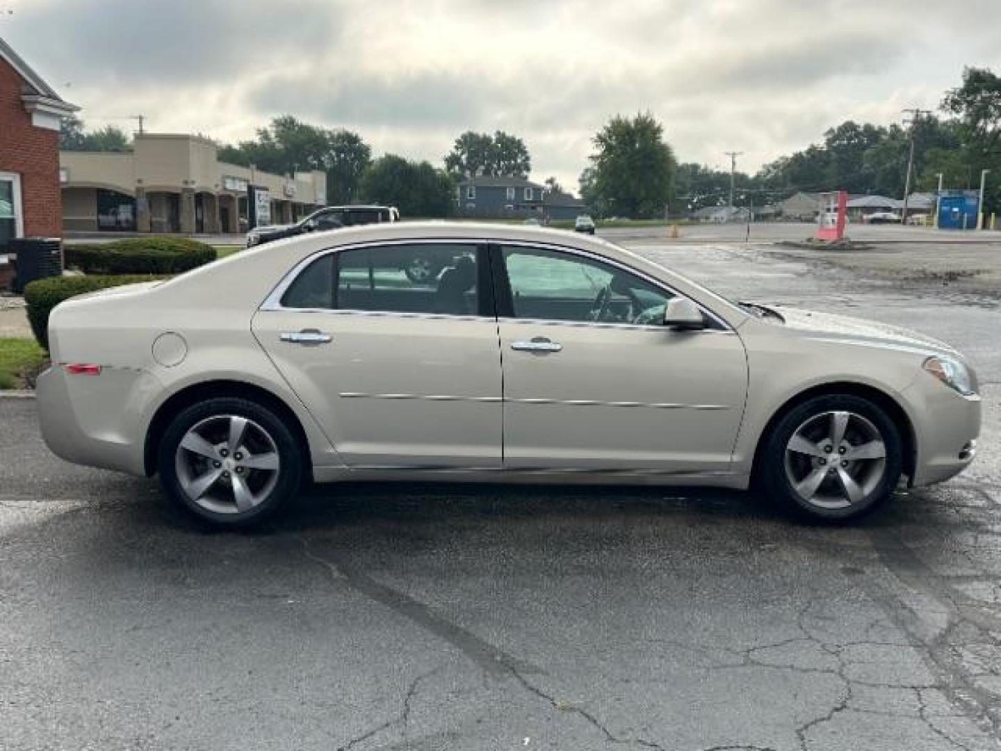 2012 Gold Mist Metallic Chevrolet Malibu 1LT (1G1ZC5E07CF) with an 2.4L L4 DOHC 16V engine, 6-Speed Automatic transmission, located at 1099 N County Rd 25A, Troy, OH, 45373, (937) 908-9800, 40.057079, -84.212883 - Photo#5