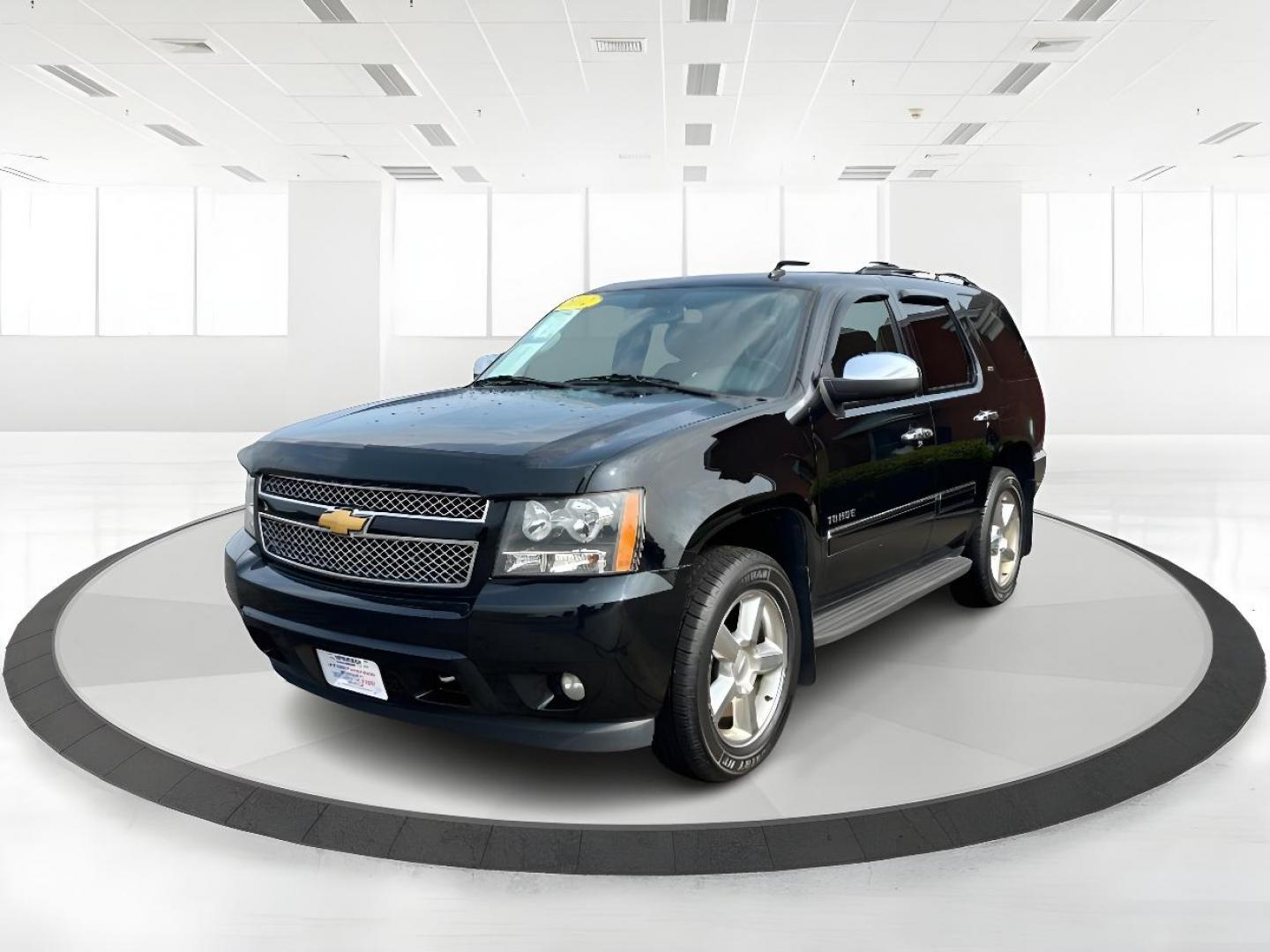 2012 Black Chevrolet Tahoe (1GNSKCE00CR) with an 5.3L V8 OHV 16V FFV engine, 6-Speed Automatic transmission, located at 401 Woodman Dr, Riverside, OH, 45431, (937) 908-9800, 39.760899, -84.123421 - Photo#5