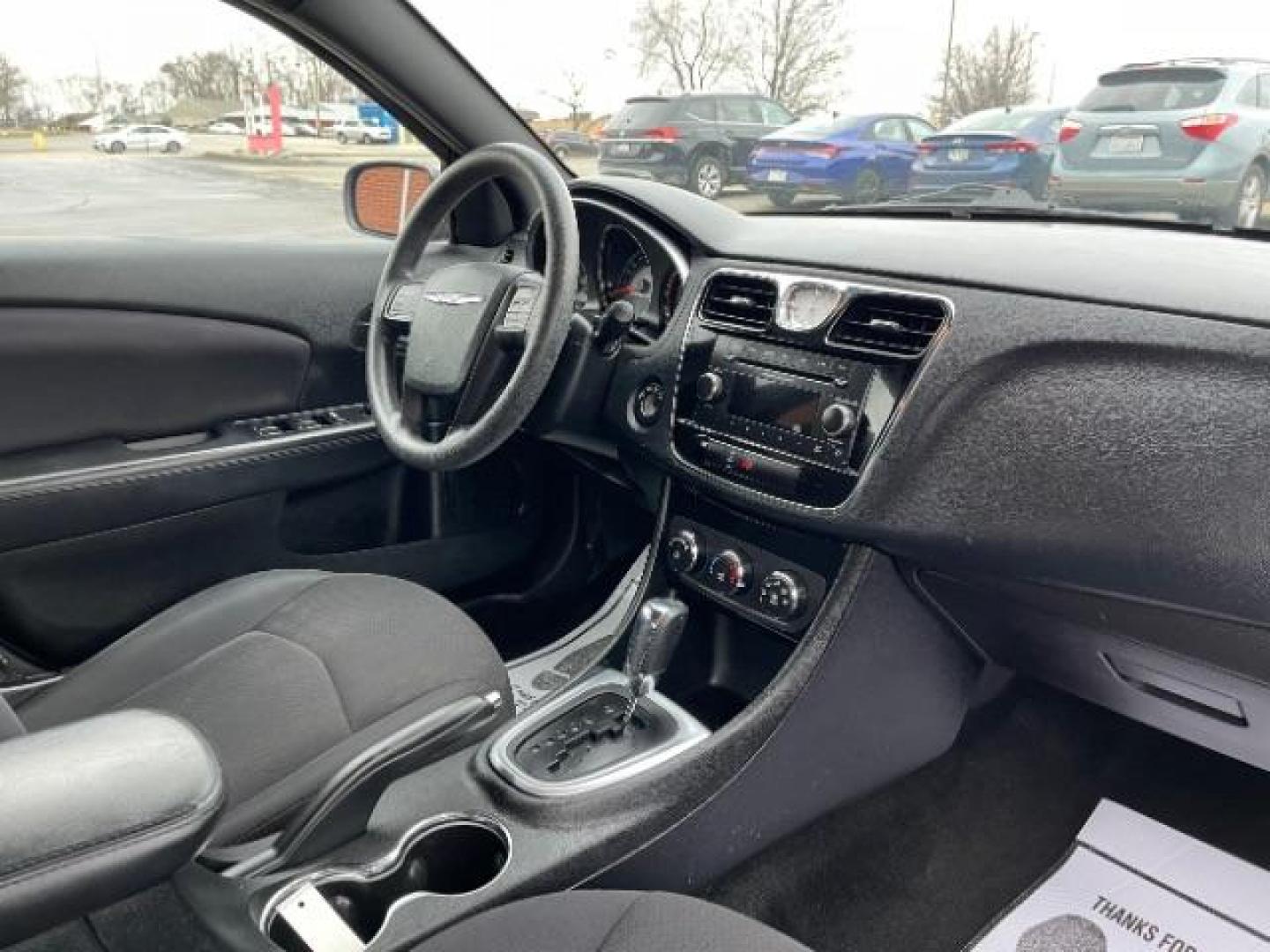 2012 Black Chrysler 200 LX (1C3CCBAB4CN) with an 2.4L L4 DOHC 16V engine, 6-Speed Automatic transmission, located at 880 E. National Road, Vandalia, OH, 45377, (937) 908-9800, 39.891918, -84.183594 - Photo#8