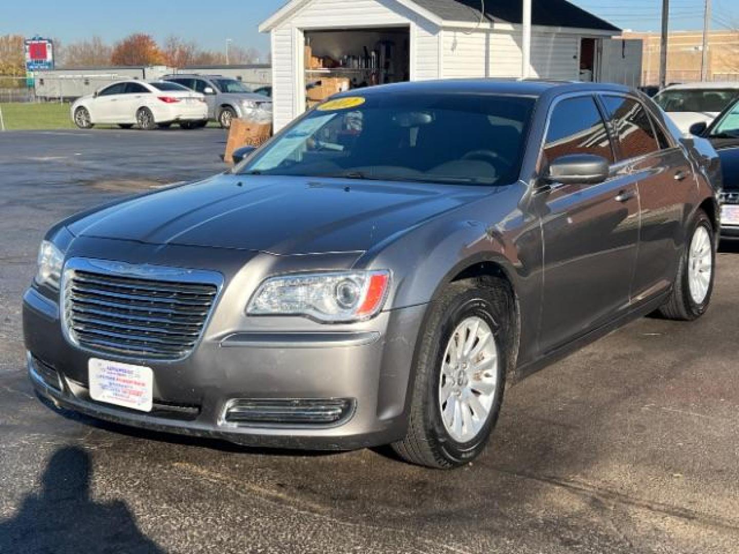 2012 Tungsten Metallic Chrysler 300 Base (2C3CCAAG9CH) with an 3.6L V6 SOHC 24V engine, 5-Speed Automatic transmission, located at 4508 South Dixie Dr, Moraine, OH, 45439, (937) 908-9800, 39.689976, -84.218452 - Photo#2