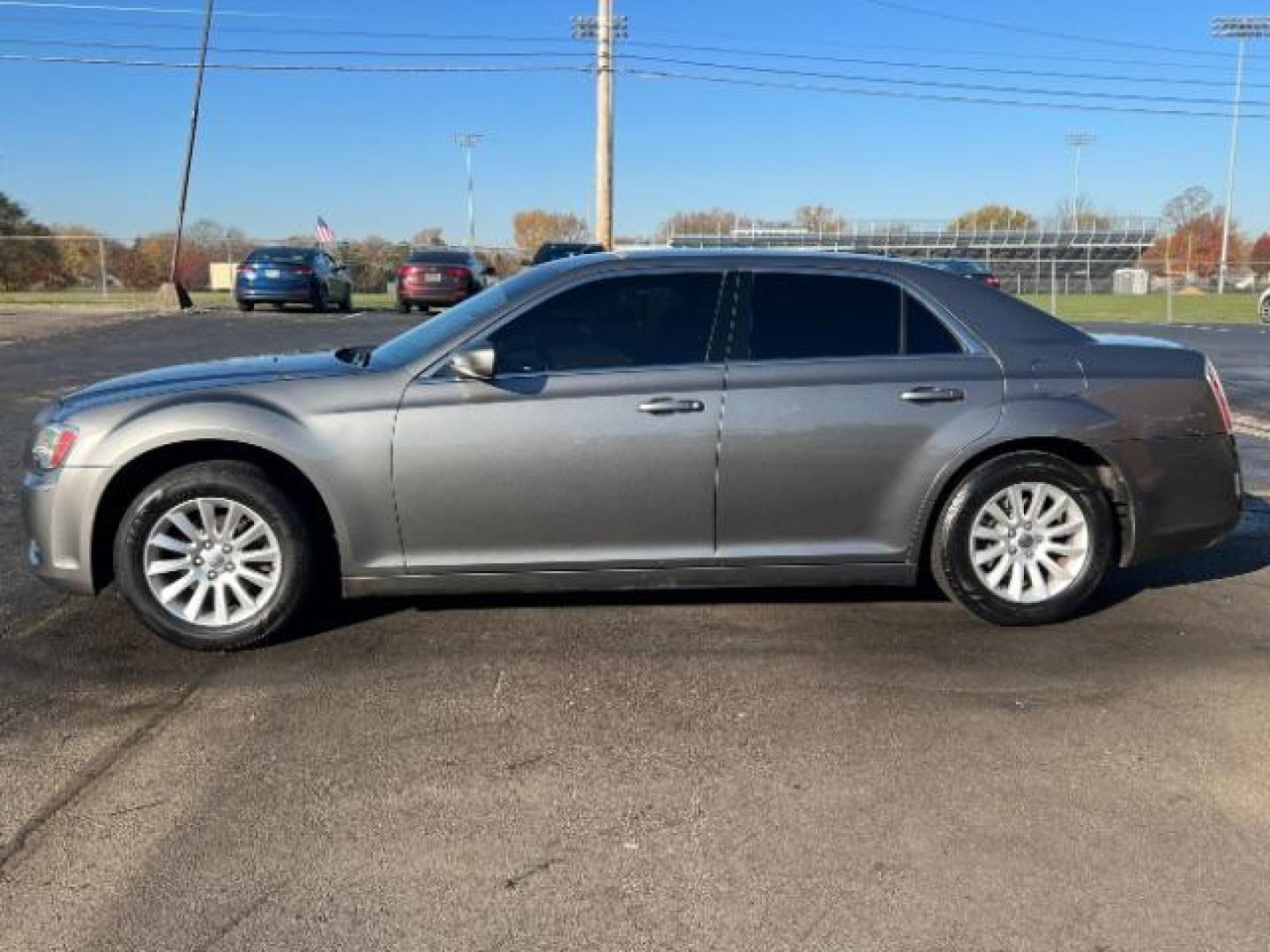 2012 Tungsten Metallic Chrysler 300 Base (2C3CCAAG9CH) with an 3.6L V6 SOHC 24V engine, 5-Speed Automatic transmission, located at 4508 South Dixie Dr, Moraine, OH, 45439, (937) 908-9800, 39.689976, -84.218452 - Photo#3