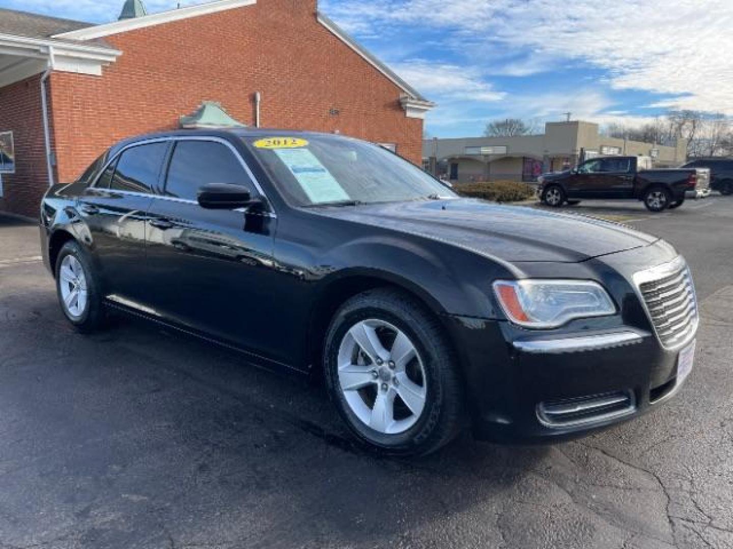 2012 Gloss Black Chrysler 300 Base (2C3CCAAG2CH) with an 3.6L V6 SOHC 24V engine, 5-Speed Automatic transmission, located at 401 Woodman Dr, Riverside, OH, 45431, (937) 908-9800, 39.760899, -84.123421 - Photo#0