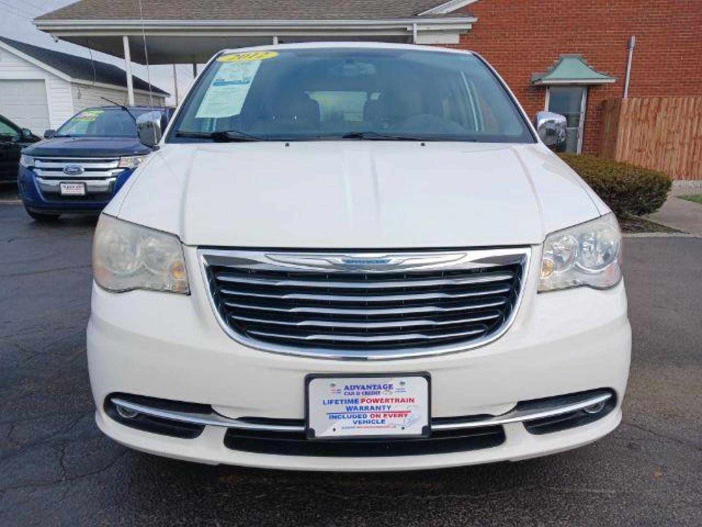 2012 Stone White Chrysler Town and Country Touring-L (2C4RC1CG4CR) with an 3.6L V6 DOHC 24V engine, 6-Speed Automatic transmission, located at 1099 N County Rd 25A, Troy, OH, 45373, (937) 908-9800, 40.057079, -84.212883 - Photo#1