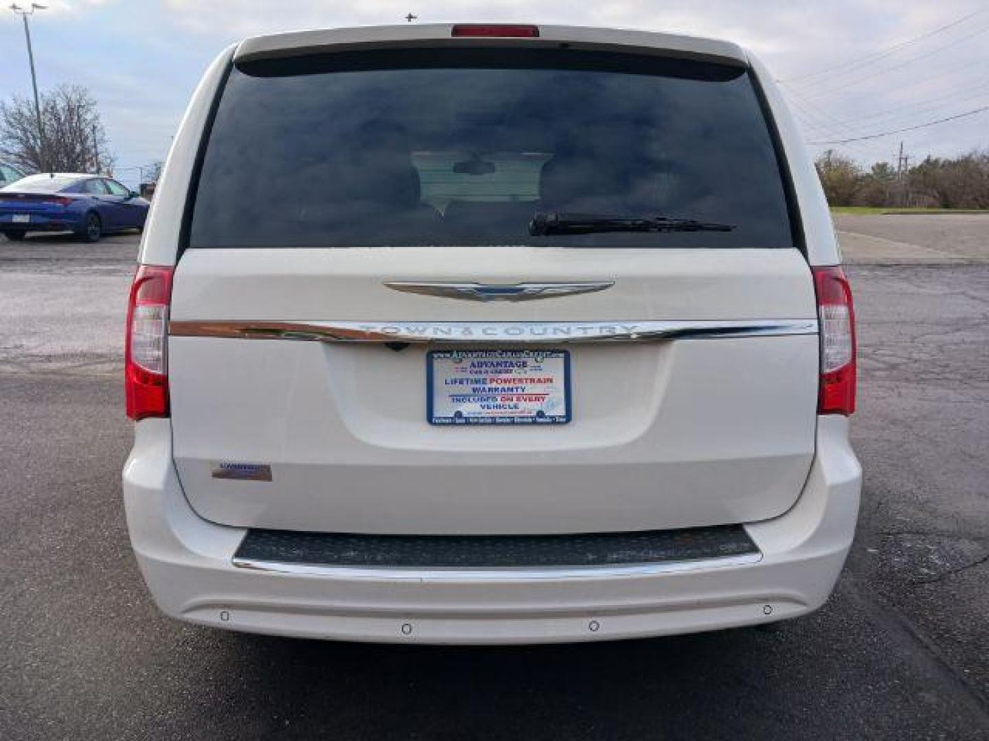 2012 Stone White Chrysler Town and Country Touring-L (2C4RC1CG4CR) with an 3.6L V6 DOHC 24V engine, 6-Speed Automatic transmission, located at 1099 N County Rd 25A, Troy, OH, 45373, (937) 908-9800, 40.057079, -84.212883 - Photo#5