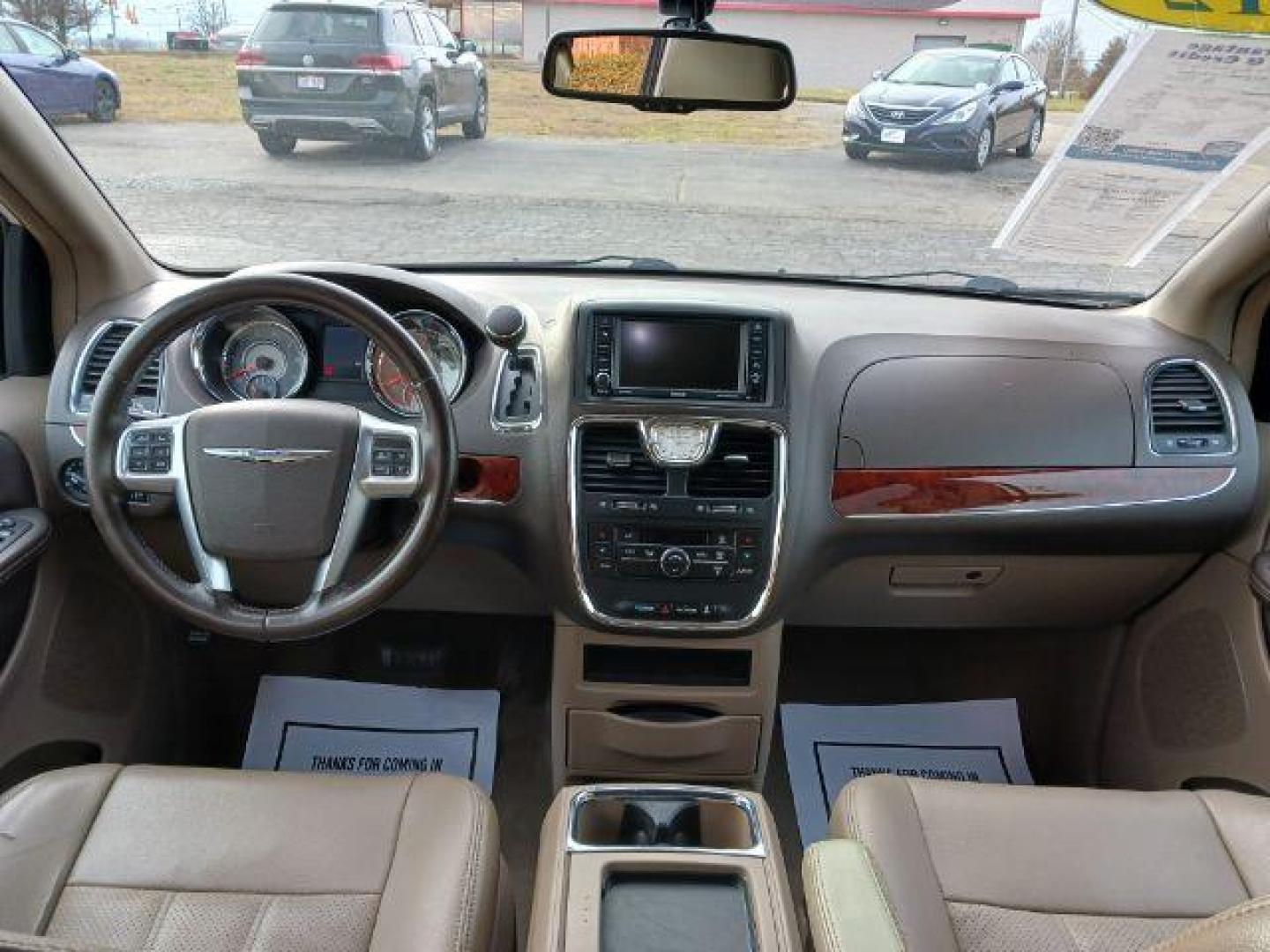 2012 Stone White Chrysler Town and Country Touring-L (2C4RC1CG4CR) with an 3.6L V6 DOHC 24V engine, 6-Speed Automatic transmission, located at 1099 N County Rd 25A, Troy, OH, 45373, (937) 908-9800, 40.057079, -84.212883 - Photo#7