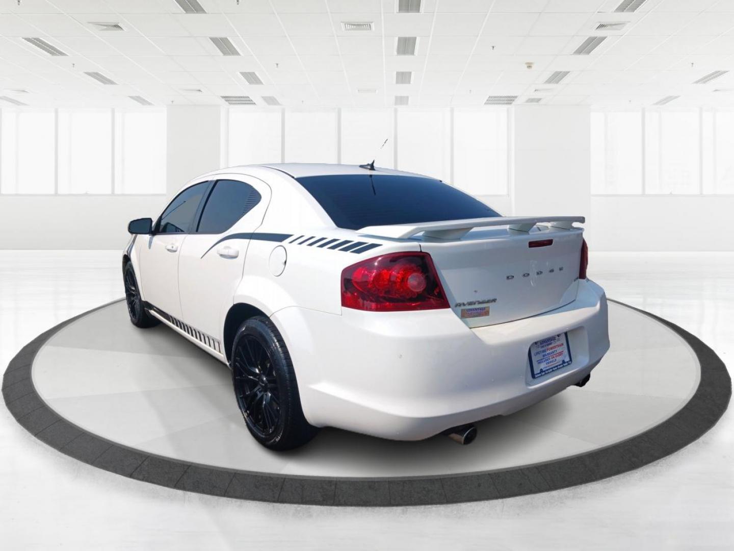 2012 Bright White Dodge Avenger (1C3CDZEG8CN) with an 3.6L V6 DOHC 24V FFV engine, 6-Speed Automatic transmission, located at 4508 South Dixie Dr, Moraine, OH, 45439, (937) 908-9800, 39.689976, -84.218452 - Photo#4