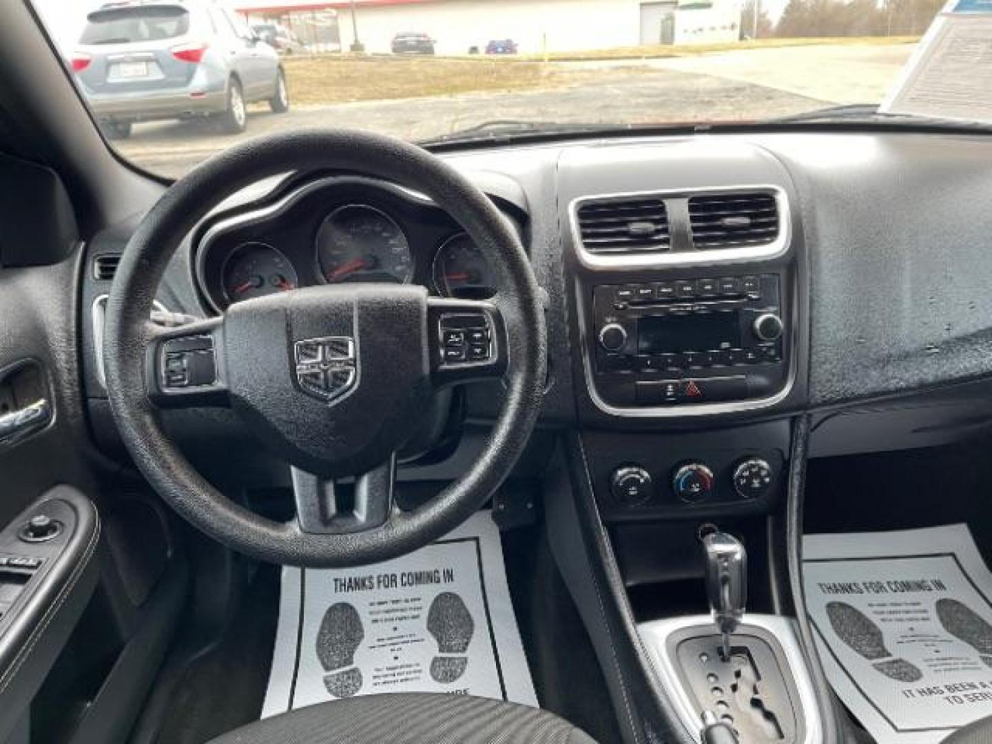 2012 Orange Dodge Avenger Base (1C3CDZAB1CN) with an 2.4L L4 DOHC 16V engine, 4-Speed Automatic transmission, located at 4508 South Dixie Dr, Moraine, OH, 45439, (937) 908-9800, 39.689976, -84.218452 - Photo#7