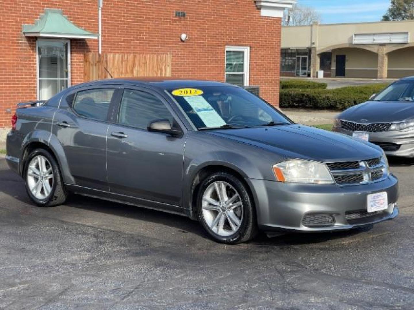 2012 Bright Silver Metallic Dodge Avenger SE (1C3CDZAG6CN) with an 3.6L V6 DOHC 24V FFV engine, 6-Speed Automatic transmission, located at 880 E. National Road, Vandalia, OH, 45377, (937) 908-9800, 39.891918, -84.183594 - Photo#0