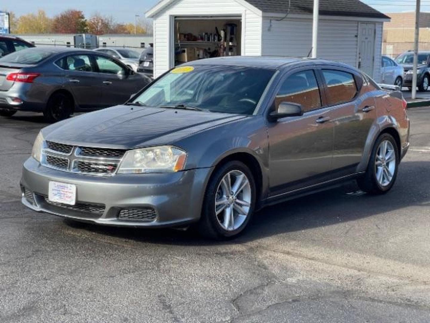 2012 Bright Silver Metallic Dodge Avenger SE (1C3CDZAG6CN) with an 3.6L V6 DOHC 24V FFV engine, 6-Speed Automatic transmission, located at 880 E. National Road, Vandalia, OH, 45377, (937) 908-9800, 39.891918, -84.183594 - Photo#1