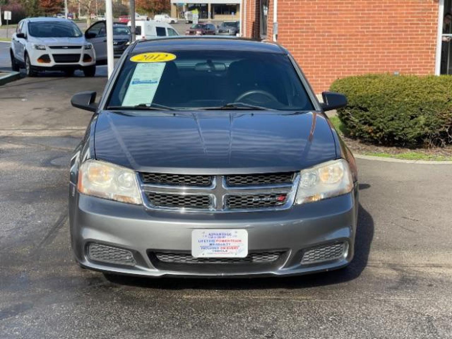 2012 Bright Silver Metallic Dodge Avenger SE (1C3CDZAG6CN) with an 3.6L V6 DOHC 24V FFV engine, 6-Speed Automatic transmission, located at 880 E. National Road, Vandalia, OH, 45377, (937) 908-9800, 39.891918, -84.183594 - Photo#4