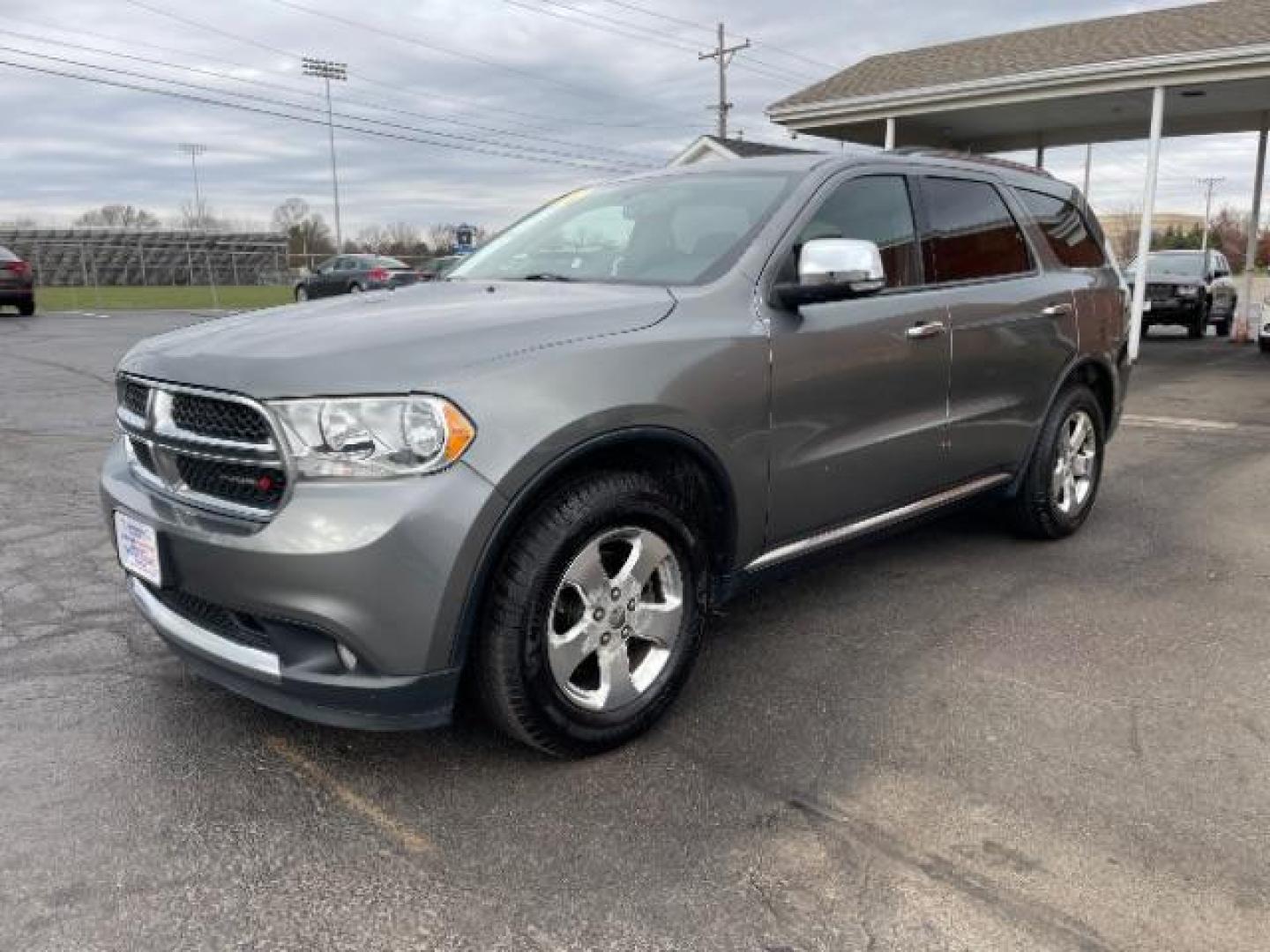 2012 Mineral Gray Metallic Dodge Durango Crew AWD (1C4RDJDG7CC) with an 3.6L V6 DOHC 24V engine, 5-Speed Automatic transmission, located at 1184 Kauffman Ave, Fairborn, OH, 45324, (937) 908-9800, 39.807072, -84.030914 - Photo#1