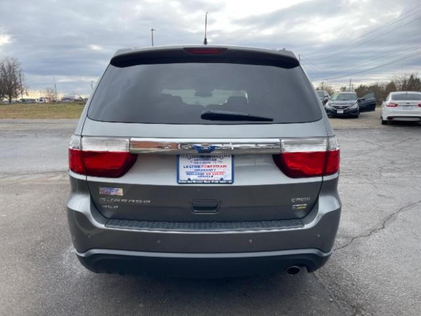 2012 Mineral Gray Metallic Dodge Durango Crew AWD (1C4RDJDG7CC) with an 3.6L V6 DOHC 24V engine, 5-Speed Automatic transmission, located at 1184 Kauffman Ave, Fairborn, OH, 45324, (937) 908-9800, 39.807072, -84.030914 - Photo#4