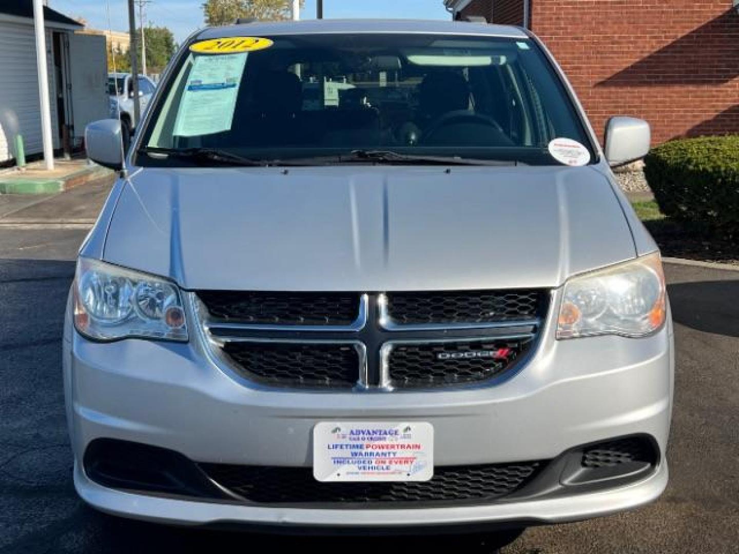 2012 Bright Silver Metallic Dodge Grand Caravan SXT (2C4RDGCG8CR) with an 3.6L V6 DOHC 24V engine, 6-Speed Automatic transmission, located at 880 E. National Road, Vandalia, OH, 45377, (937) 908-9800, 39.891918, -84.183594 - Photo#1