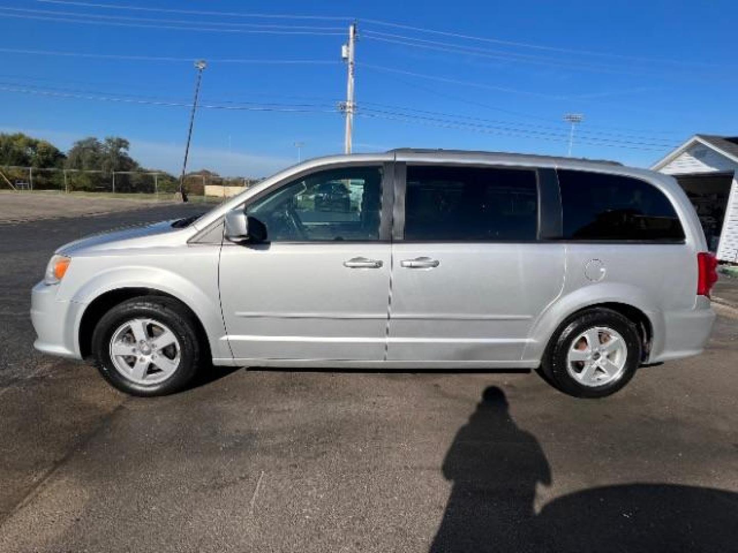 2012 Bright Silver Metallic Dodge Grand Caravan SXT (2C4RDGCG8CR) with an 3.6L V6 DOHC 24V engine, 6-Speed Automatic transmission, located at 880 E. National Road, Vandalia, OH, 45377, (937) 908-9800, 39.891918, -84.183594 - Photo#3