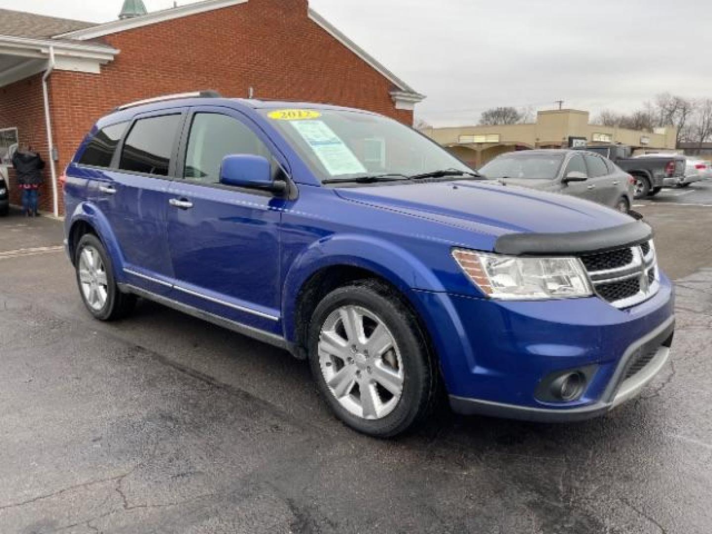 2012 Blue Pearl Coat Dodge Journey Crew (3C4PDCDG0CT) with an 3.6L V6 DOHC 24V engine, 6-Speed Automatic transmission, located at 1099 N County Rd 25A, Troy, OH, 45373, (937) 908-9800, 40.057079, -84.212883 - Photo#0