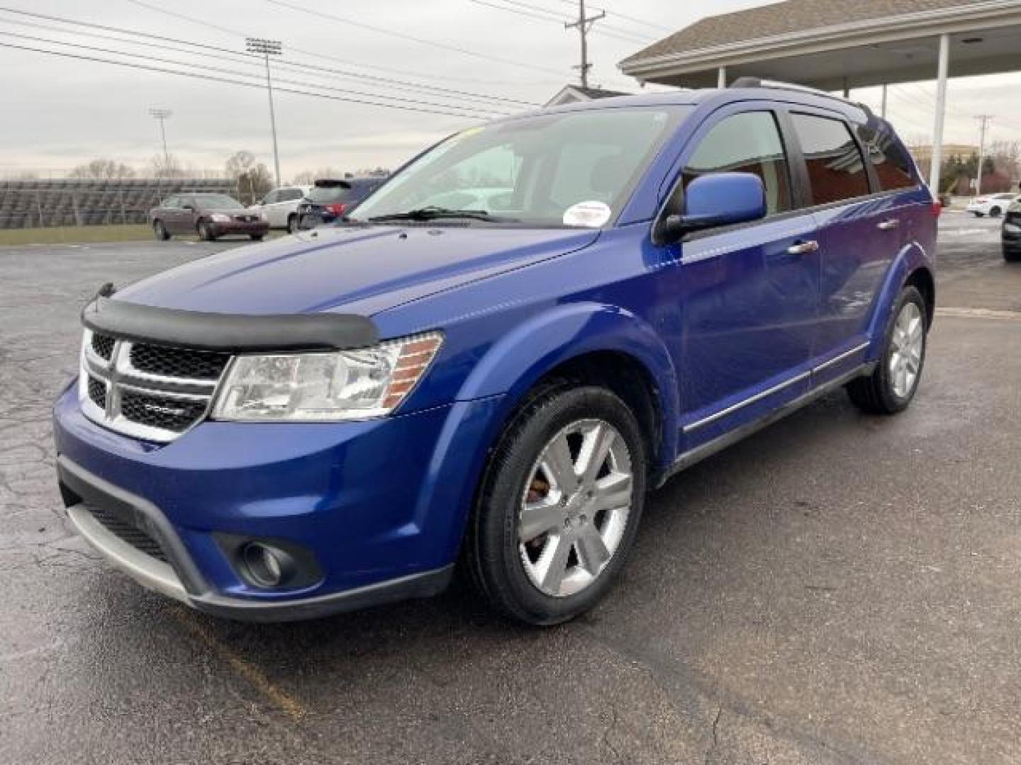 2012 Blue Pearl Coat Dodge Journey Crew (3C4PDCDG0CT) with an 3.6L V6 DOHC 24V engine, 6-Speed Automatic transmission, located at 1099 N County Rd 25A, Troy, OH, 45373, (937) 908-9800, 40.057079, -84.212883 - Photo#1