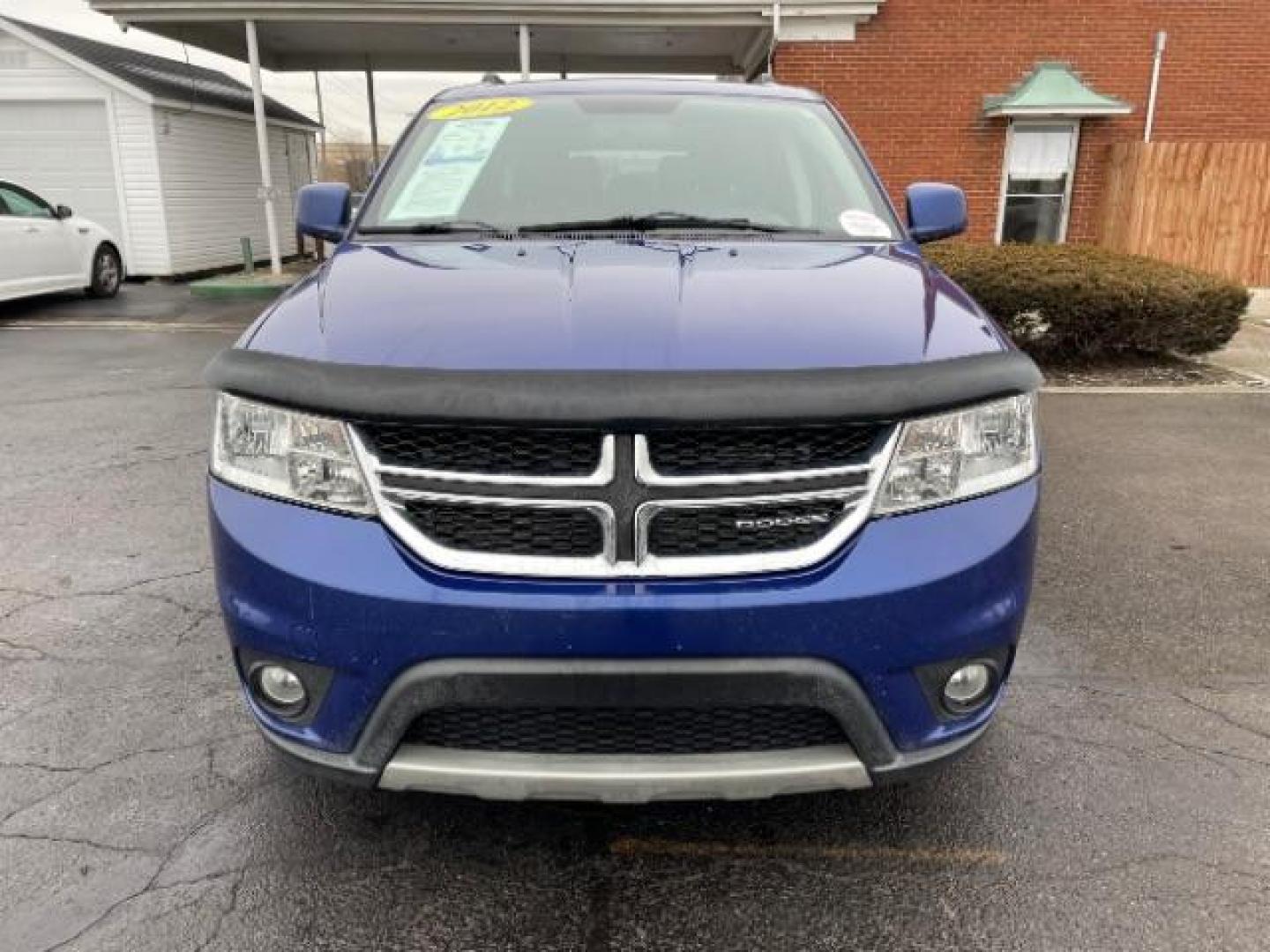 2012 Blue Pearl Coat Dodge Journey Crew (3C4PDCDG0CT) with an 3.6L V6 DOHC 24V engine, 6-Speed Automatic transmission, located at 1099 N County Rd 25A, Troy, OH, 45373, (937) 908-9800, 40.057079, -84.212883 - Photo#2