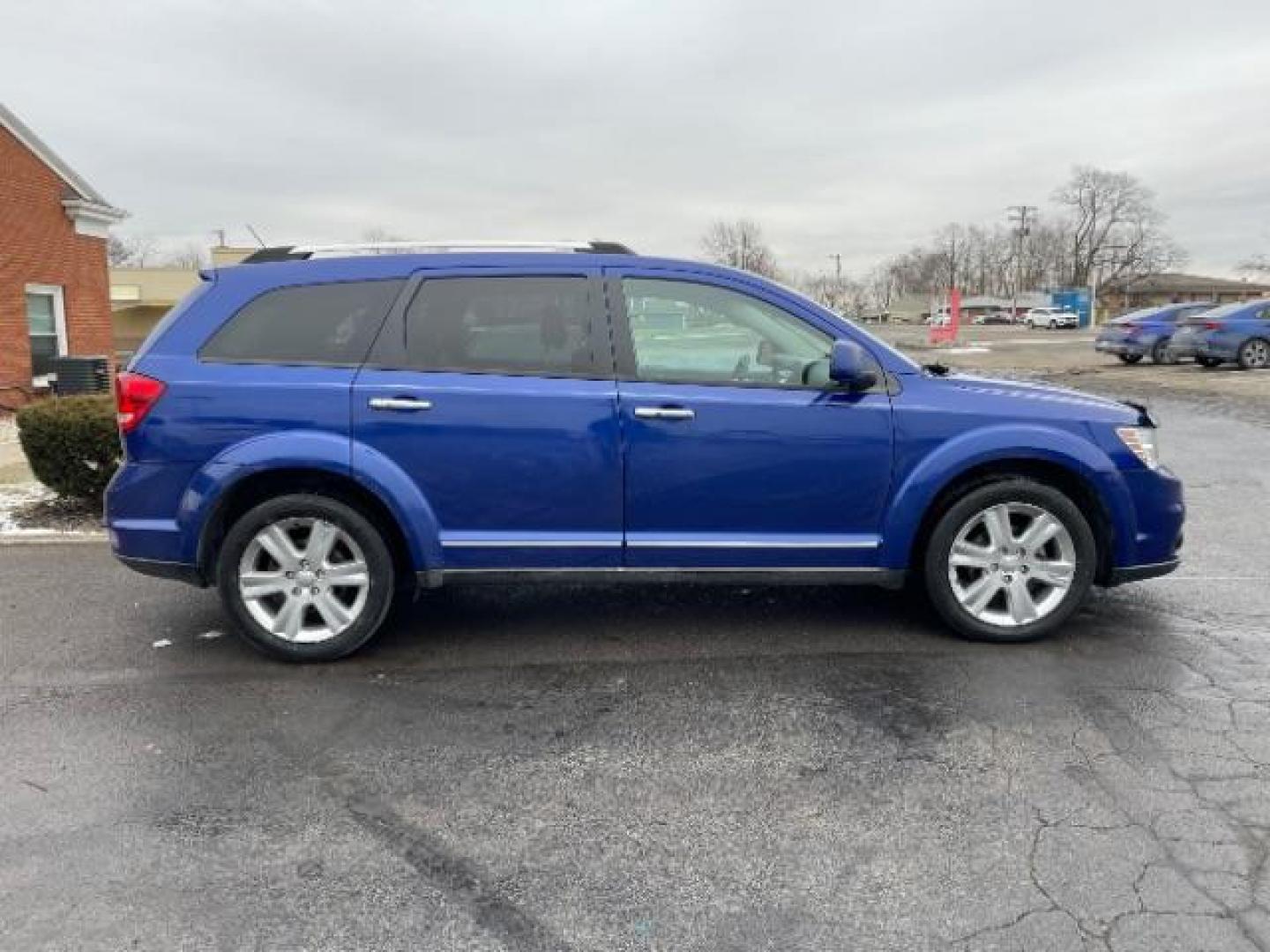 2012 Blue Pearl Coat Dodge Journey Crew (3C4PDCDG0CT) with an 3.6L V6 DOHC 24V engine, 6-Speed Automatic transmission, located at 1099 N County Rd 25A, Troy, OH, 45373, (937) 908-9800, 40.057079, -84.212883 - Photo#4