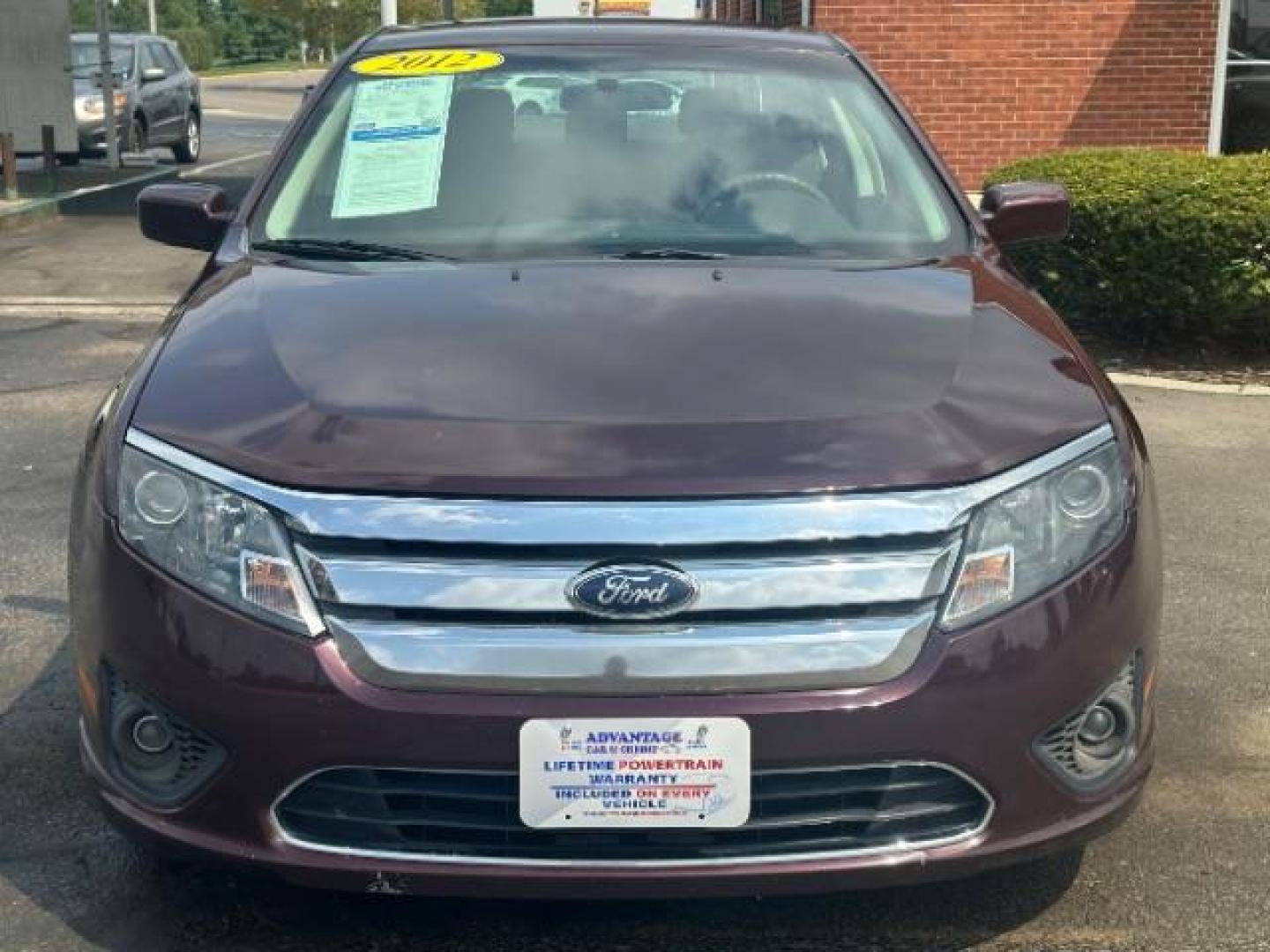 2012 Cinnamon Metallic Ford Fusion SE (3FAHP0HA1CR) with an 2.5L L4 DOHC 16V engine, located at 1230 East Main St, Xenia, OH, 45385, (937) 908-9800, 39.688026, -83.910172 - Photo#1