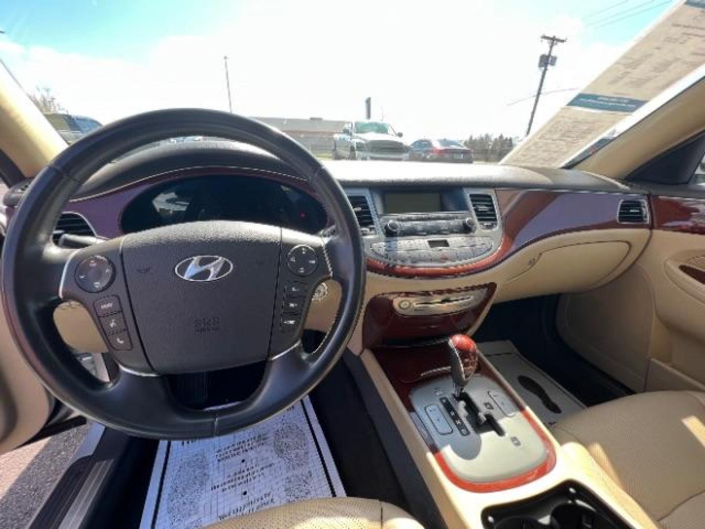 2012 Platinum Metallic Hyundai Genesis 3.8L (KMHGC4DD8CU) with an 3.8L V6 DOHC 24V engine, 6-Speed Automatic transmission, located at 1099 N County Rd 25A, Troy, OH, 45373, (937) 908-9800, 40.057079, -84.212883 - Photo#10