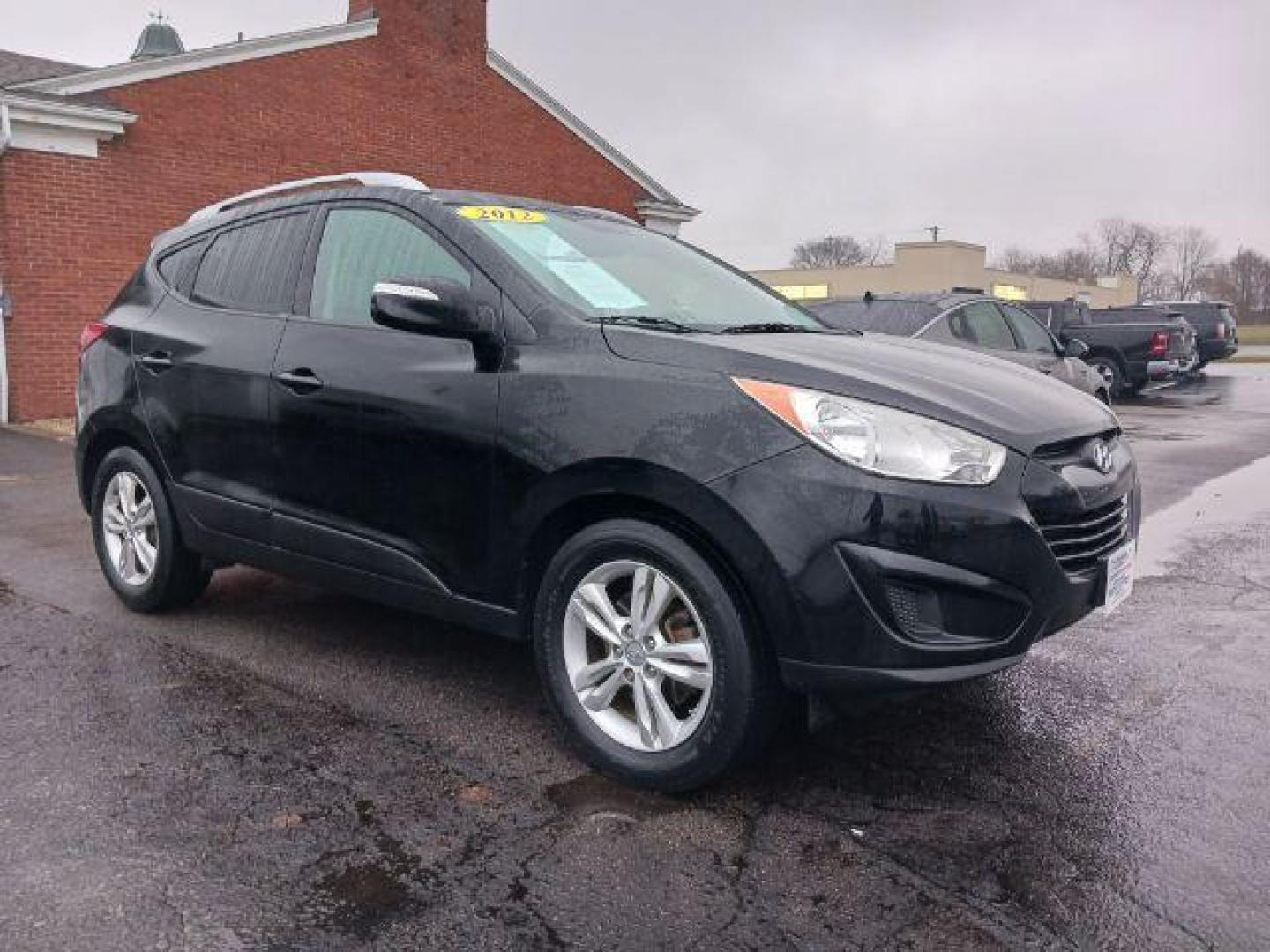 2012 Ash Black Mica Hyundai Tucson GLS AWD (KM8JUCAC9CU) with an 2.4L L4 DOHC 16V engine, 6-Speed Automatic transmission, located at 1230 East Main St, Xenia, OH, 45385, (937) 908-9800, 39.688026, -83.910172 - Photo#0