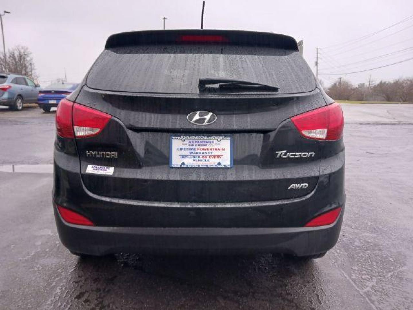 2012 Ash Black Mica Hyundai Tucson GLS AWD (KM8JUCAC9CU) with an 2.4L L4 DOHC 16V engine, 6-Speed Automatic transmission, located at 1230 East Main St, Xenia, OH, 45385, (937) 908-9800, 39.688026, -83.910172 - Photo#5