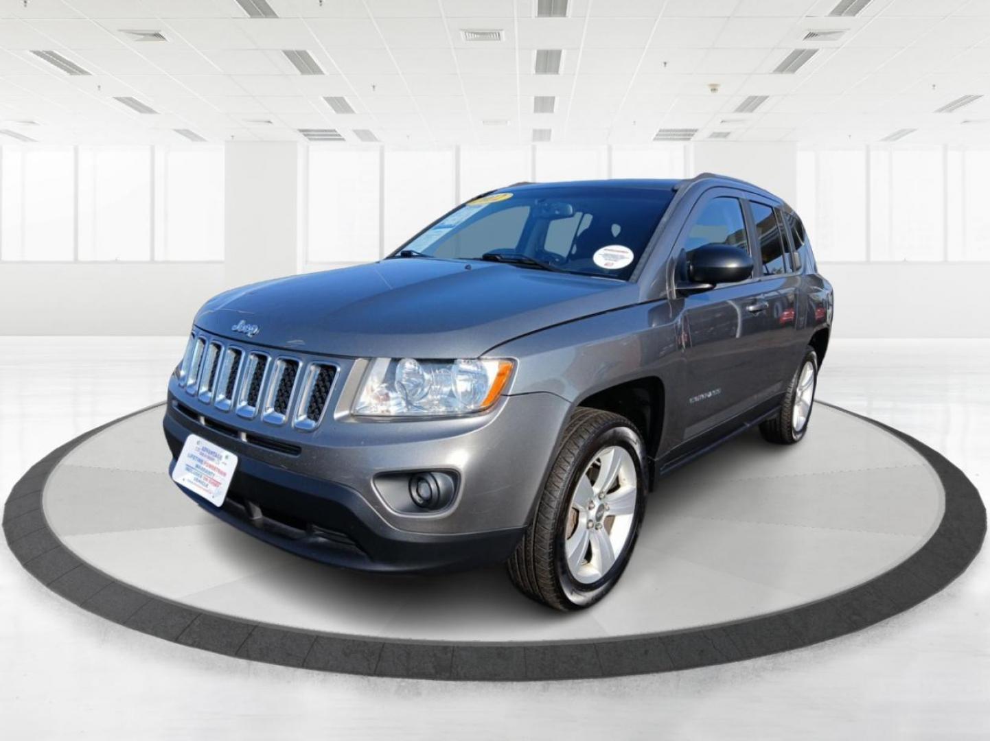 2012 Mineral Gray Metallic Jeep Compass Sport 4WD (1C4NJDBB6CD) with an 2.4L L4 DOHC 16V engine, located at 1951 S Dayton Lakeview Rd., New Carlisle, OH, 45344, (937) 908-9800, 39.890999, -84.050255 - Photo#7