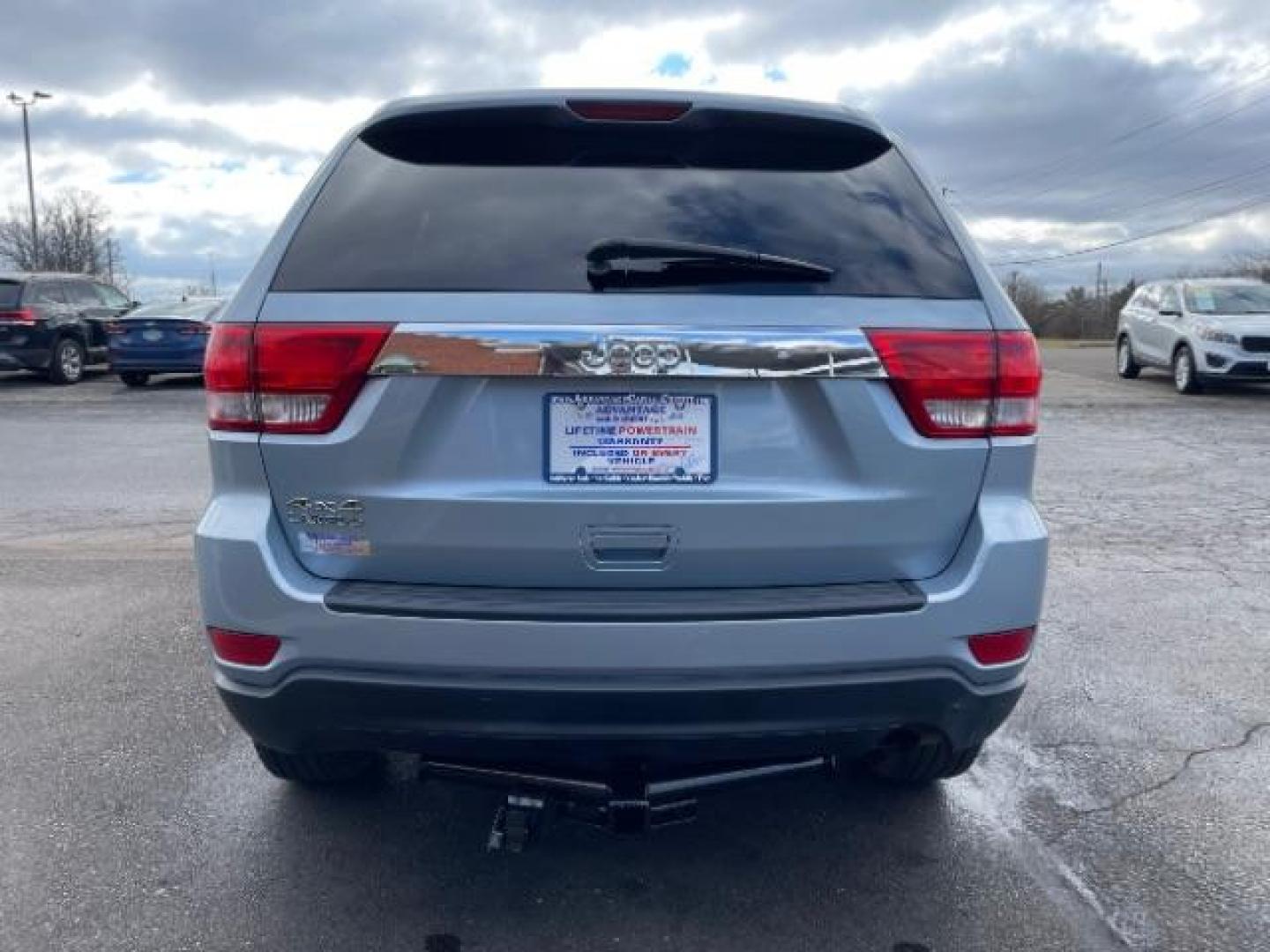 2012 True Blue Pearl Jeep Grand Cherokee Laredo 4WD (1C4RJFAG7CC) with an 3.6L V6 DOHC 24V engine, 5-Speed Automatic transmission, located at 1099 N County Rd 25A, Troy, OH, 45373, (937) 908-9800, 40.057079, -84.212883 - Photo#5