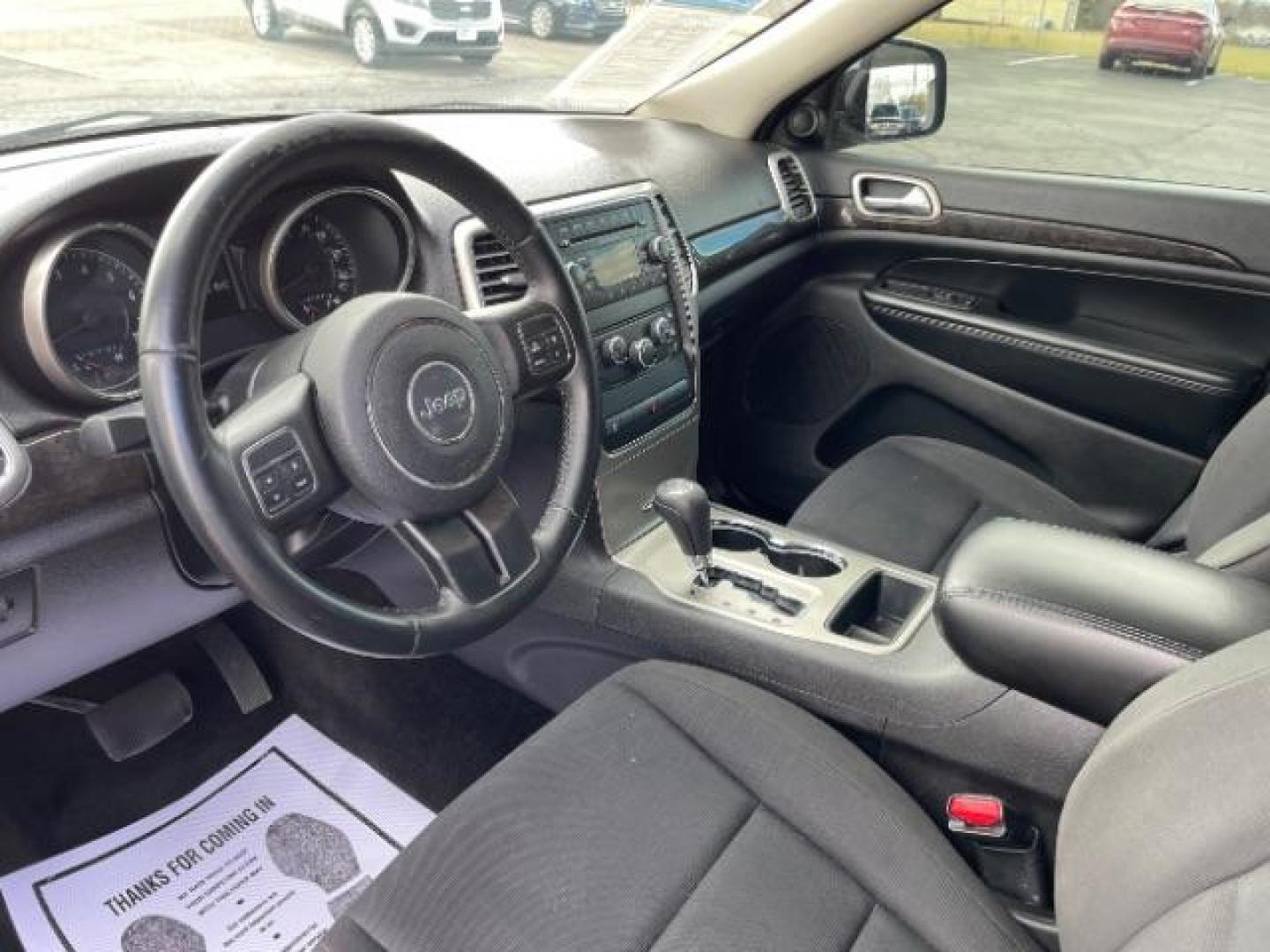 2012 True Blue Pearl Jeep Grand Cherokee Laredo 4WD (1C4RJFAG7CC) with an 3.6L V6 DOHC 24V engine, 5-Speed Automatic transmission, located at 1099 N County Rd 25A, Troy, OH, 45373, (937) 908-9800, 40.057079, -84.212883 - Photo#6